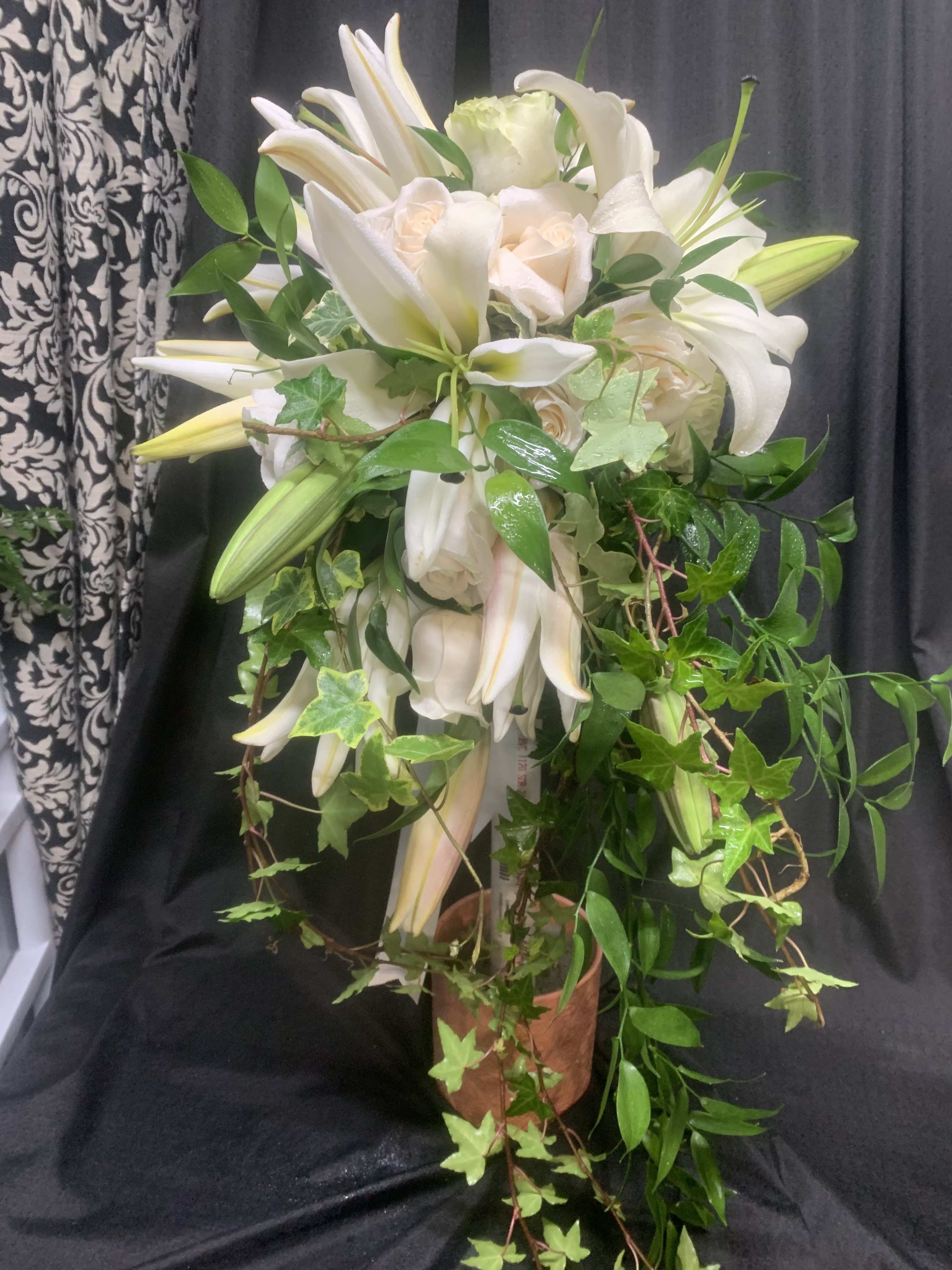 LILY CASCADE BRIDAL BOUQUET - LILIES AND ROSES IN THIS CASCADING WHITE BOUQUET