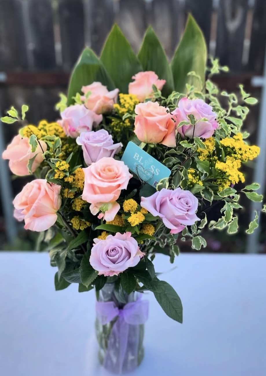 Hugs and Petals Hugs and Petals - Sweeten someones day with this charming arrangement. Perfect for a cute surprise!