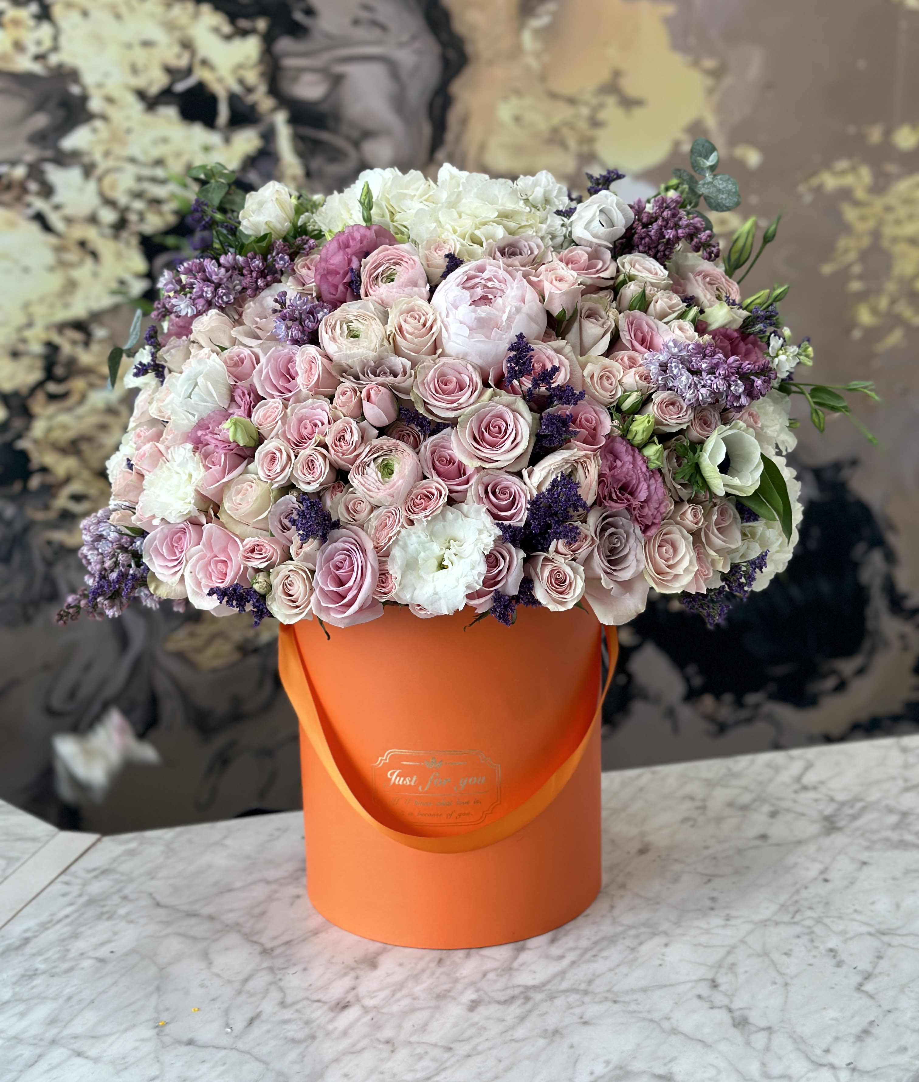 Spring dream  - Brighten any space with our Elegant Flower Box Arrangement! Bursting with vibrant blooms, this stunning display combines seasonal favorites with lush fillers.   Housed in a chic, reusable container, it makes a perfect centerpiece for any occasion be it a gift or a treat for yourself. Elevate your decor with this captivating arrangement that brings joy and sophistication to your home or office. Order yours today and let the beauty of flowers inspire you!