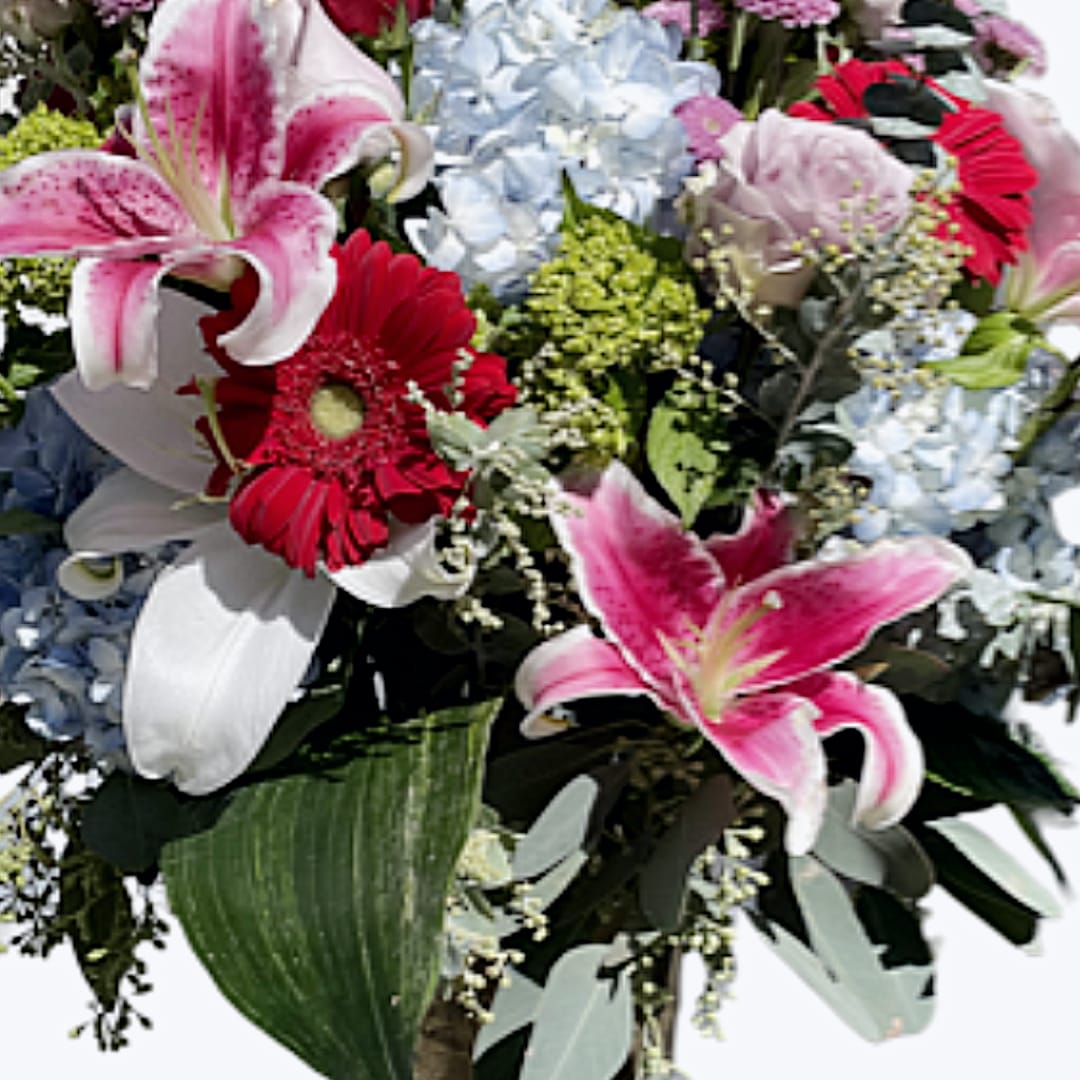 Lovestruck - A Romantic Symphony of Stunning Blooms Sweep someone off their feet with Lovestruck, a breathtaking arrangement designed to captivate the heart. Overflowing with premium flowers and expertly styled, this luxurious composition is the perfect romantic gesture for any special occasion. **Exquisite Floral Selection: One of our uniquely curated vases holds an exquisite, delicate floral arrangement that complements any interior. Florals of pink and white comprise the designer's chosen color palette. **Romantic Elegance: Designed to convey love and passion, making it an ideal gift for anniversaries, Mother's Day, Valentine’s Day, or simply to say, &quot;I love you.&quot; **Deluxe Size: Shown at an impressive 34”h x 23”w, this arrangement makes a bold and unforgettable statement. With Lovestruck, express your deepest feelings through a symphony of color, texture, and fragrance. A perfect way to create lasting memories and show your love in the most beautiful way possible!
