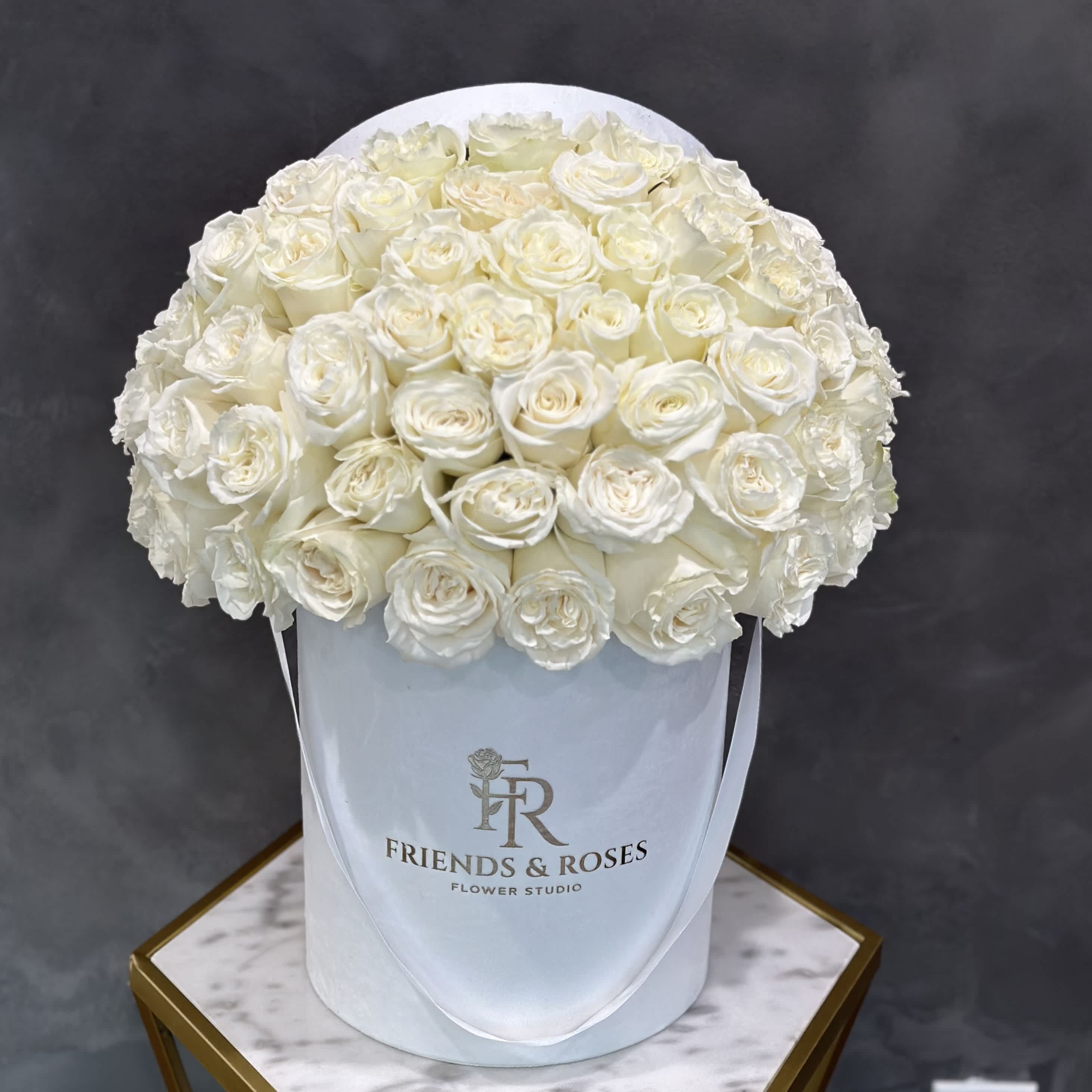 Snow White Snow White - For every occasion, our classic white box with 50 fresh white roses makes a truly lovely and endearing present.