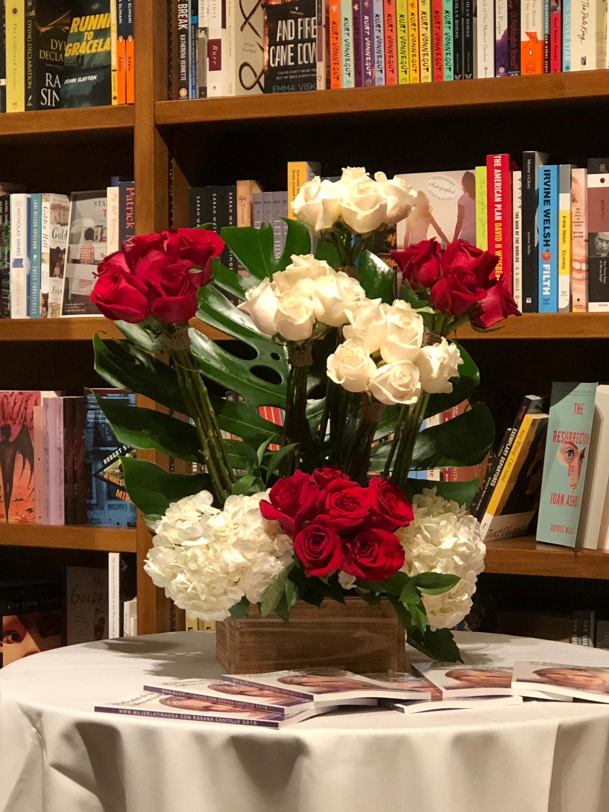 ALL TO YOU ALL TO YOU - LUXURY ARRANGEMENT WITH 36 ROSES AND EXQUISITE TOUCH OF HYDRANGEAS IN A WOOD VASE AND TROPICAL GREENS Flowers and similar colors
