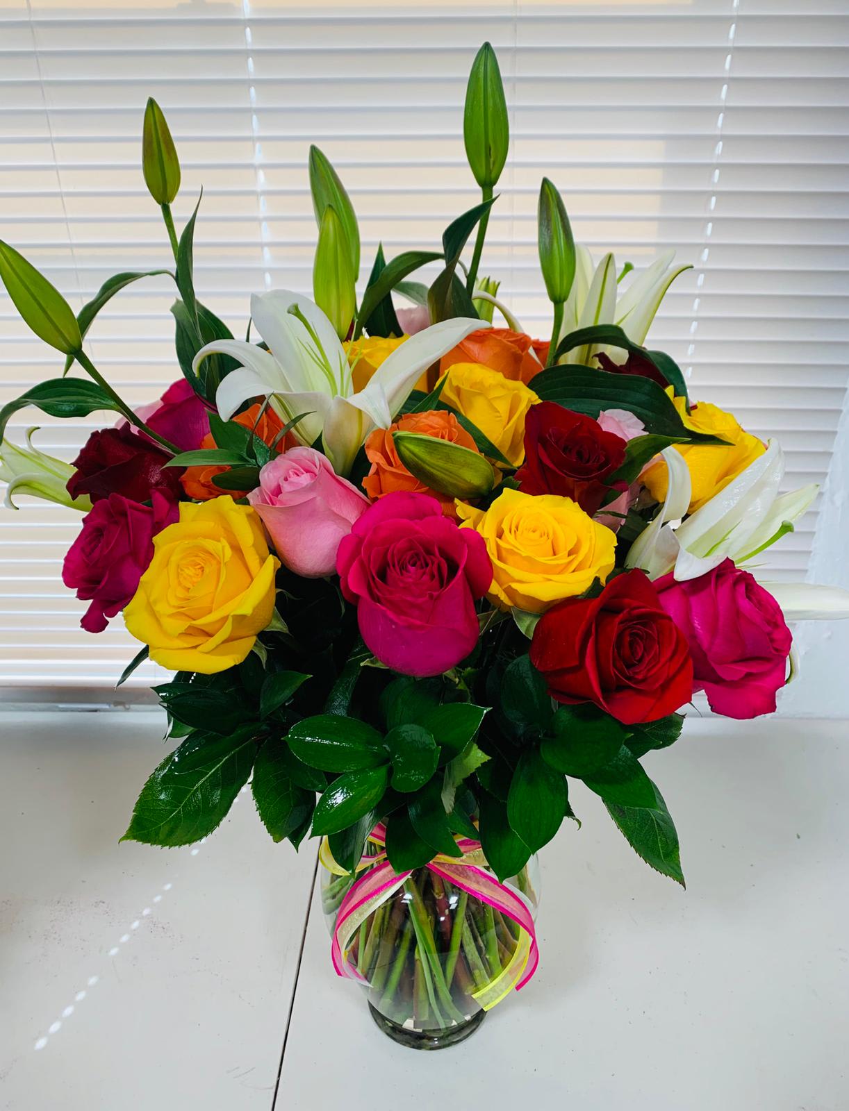 Sensation of roses and lilies - Beautiful colorful arrangement of 24 roses and lilies  Flowers and similar colors