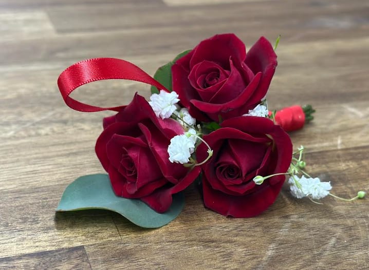 Boutonniere - Great for any occasion.   You can change the color of the flower or ribbon by calling or emailing us direct.   