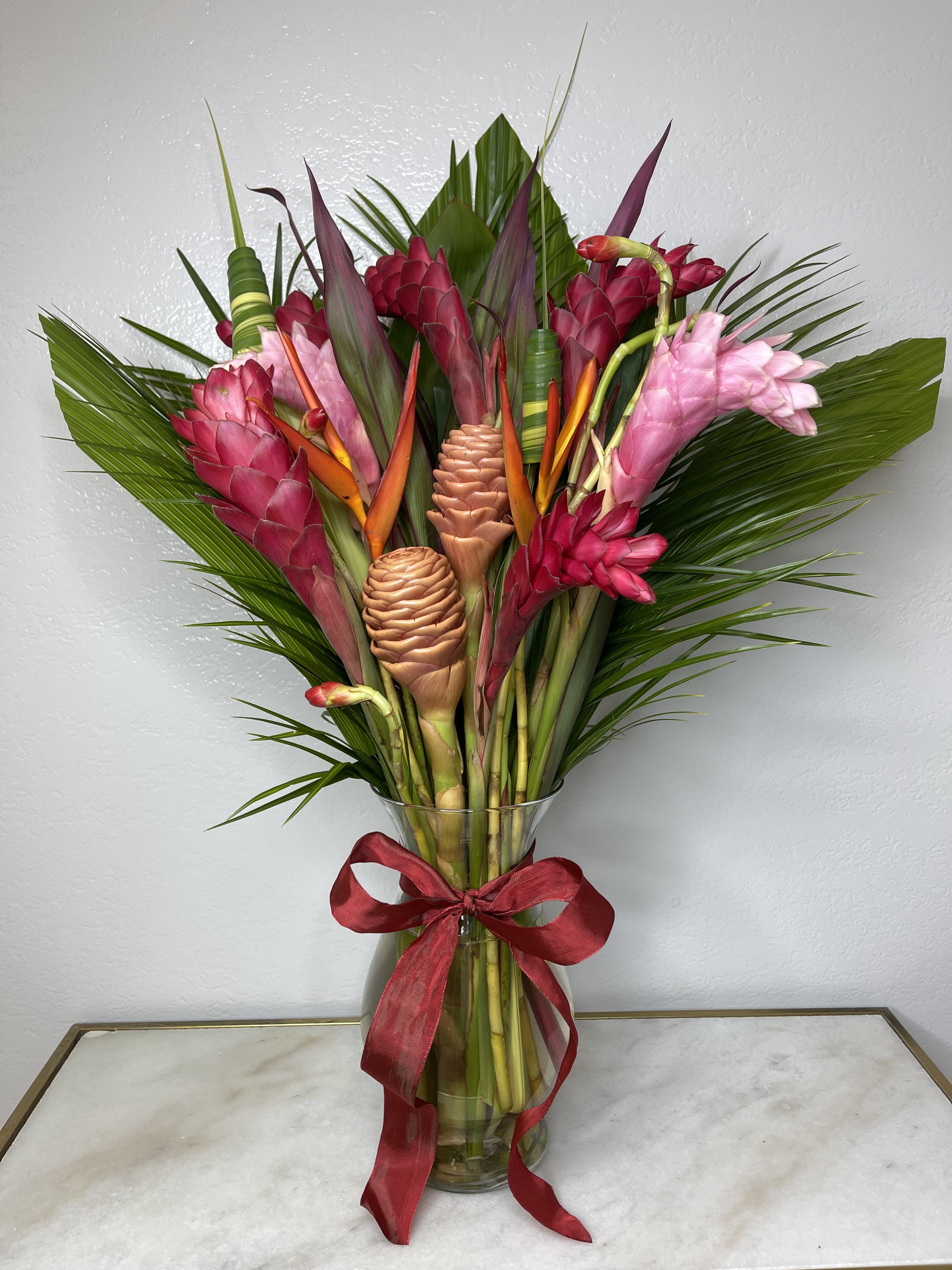 Tropical splash - This amazing tropical arrangement is sure to brighten anyones day