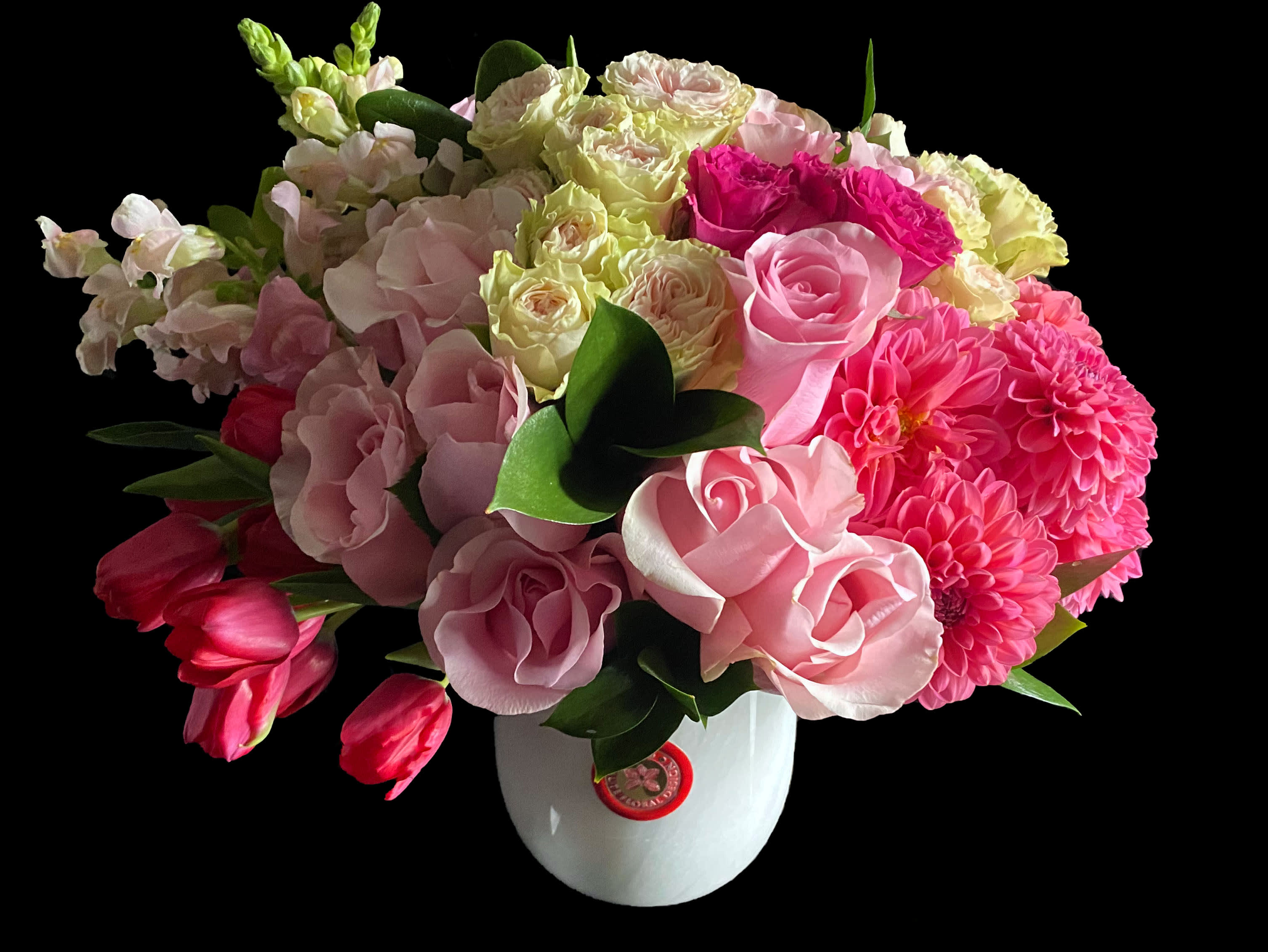 Pink Floral on Gray Marble - Gray marble vase with pink toned seasonal blooms. Approximate measurements 12 in H by 12 inch W.