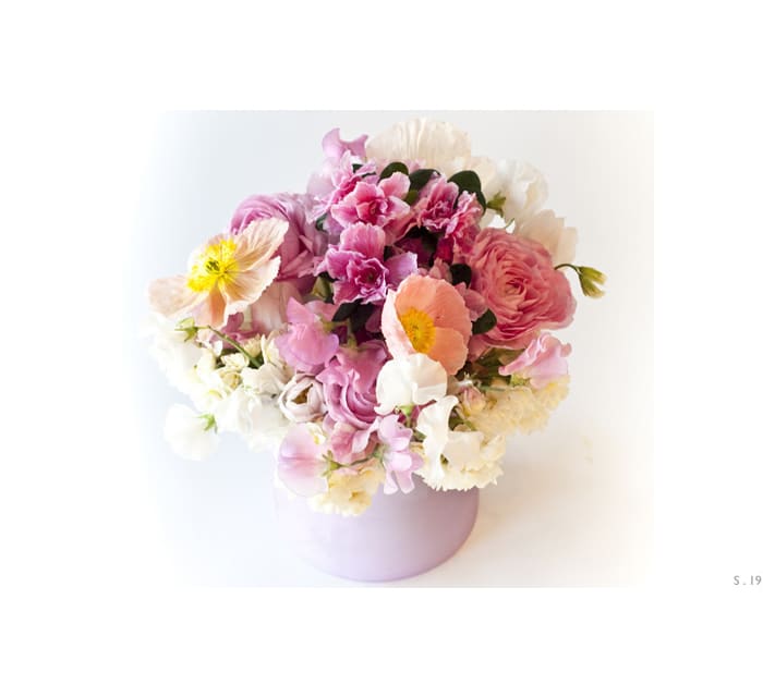 Rosa Rosa - Seasonal blooms in a lavender posy vase.