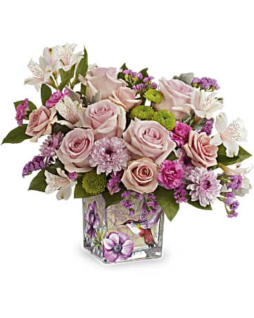 Hummingbird Surprise Bouquet Hummingbird Surprise Bouquet - A sweet surprise, this feminine rose bouquet is perfectly presented in a whimsical hummingbird-adorned cube vase.