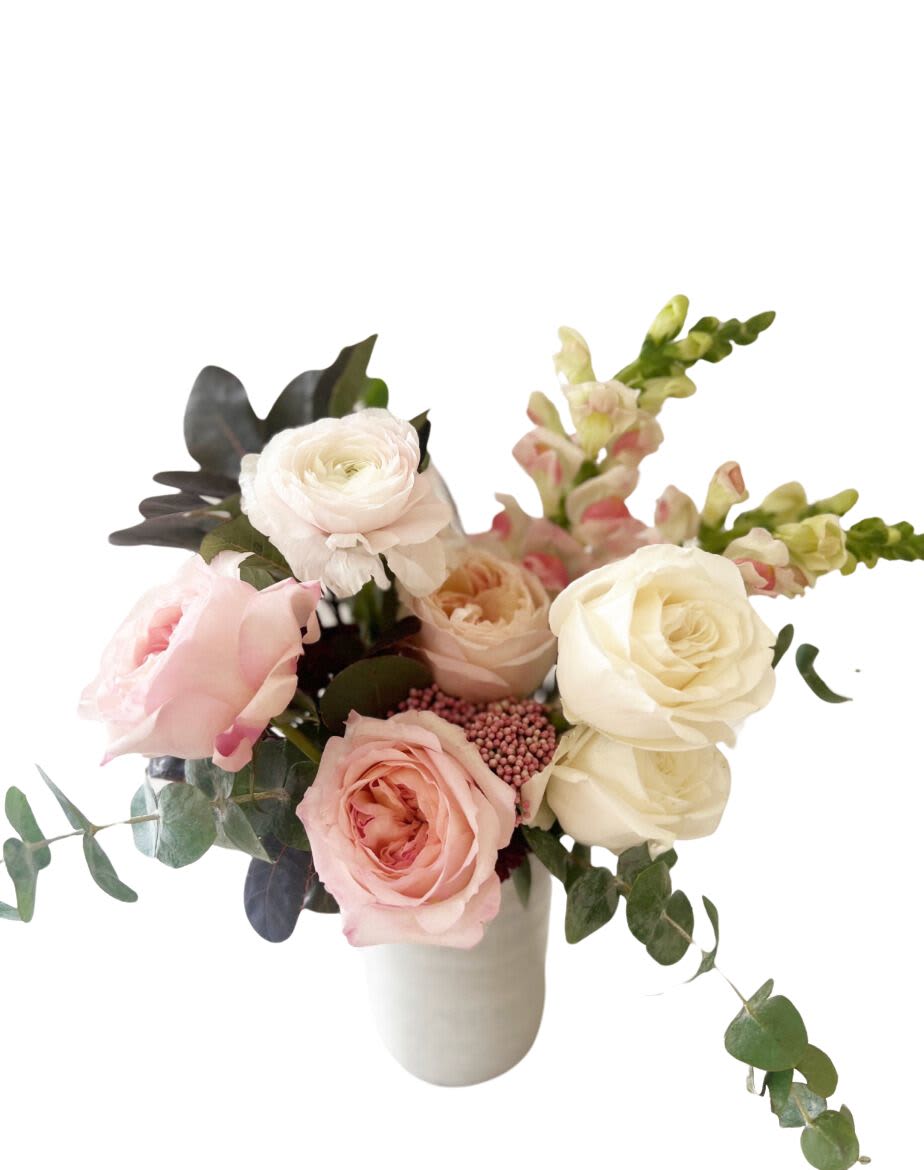 DESIGNERS CHOICE - **ARRANGEMENT NOT AVAILABLE FOR MOTHER'S DAY WEEK**  Our designers will design a unique, seasonal arrangement in our signature TULIP style using the freshest seasonal flowers available at the time your order is placed. Arranged in a vase of our choice to complement your design.    Types of flowers to expect:  hydrangea, roses, ranunculus, snap dragons, delphinium, peonies, protea, seasonal greenery, ect...   Please note... flower choices are based on availability, freshness and beauty.  Designer choice arrangements will contain a selection of the flowers listed above, but we cannot guarantee the exact variety.  Designers choice will be designed in our signature TULIP style.  