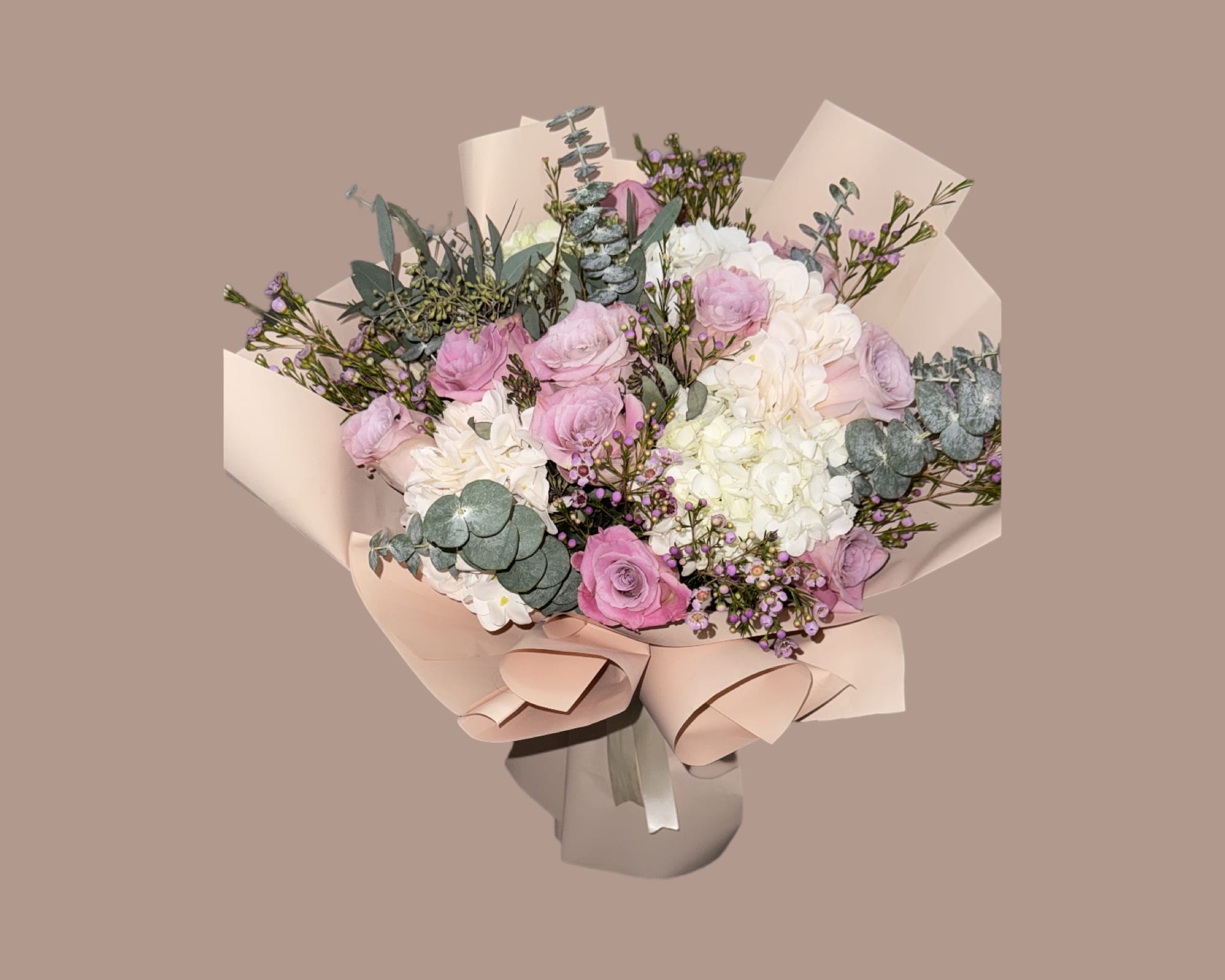 Mixed bouquet  - Roses,eucalyptus,wax flower, hydrangeas 