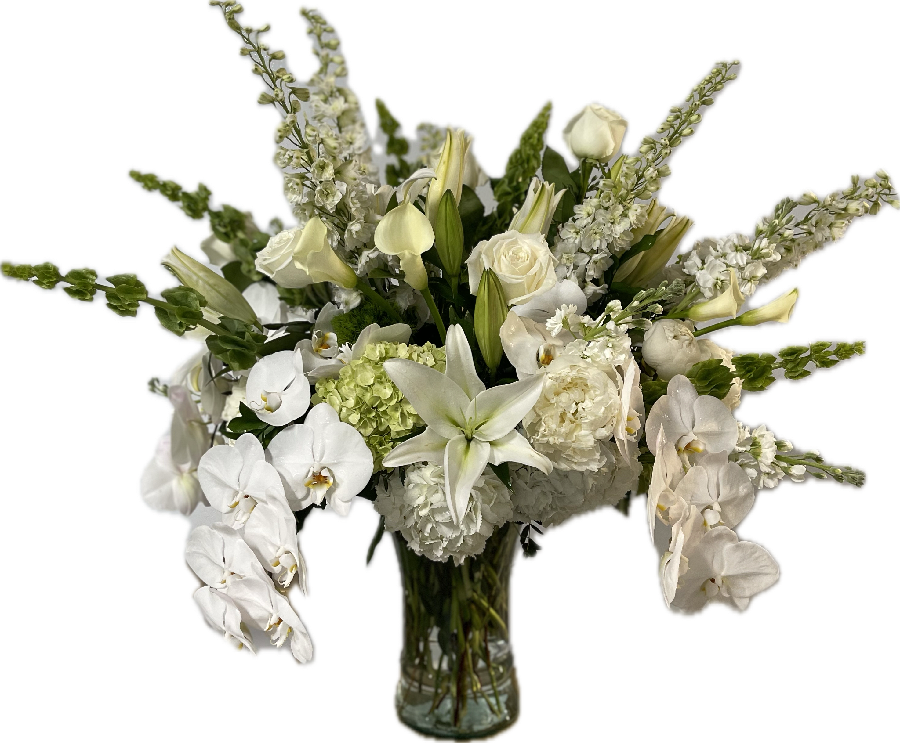 Bianca  Bianca  - Stunning tall vase of an amazing variety of white flowers...Phalaenopsis orchids, roses, cala lilies, lilies, hydrangea, white delphinium, belles of Ireland, peonies, stock