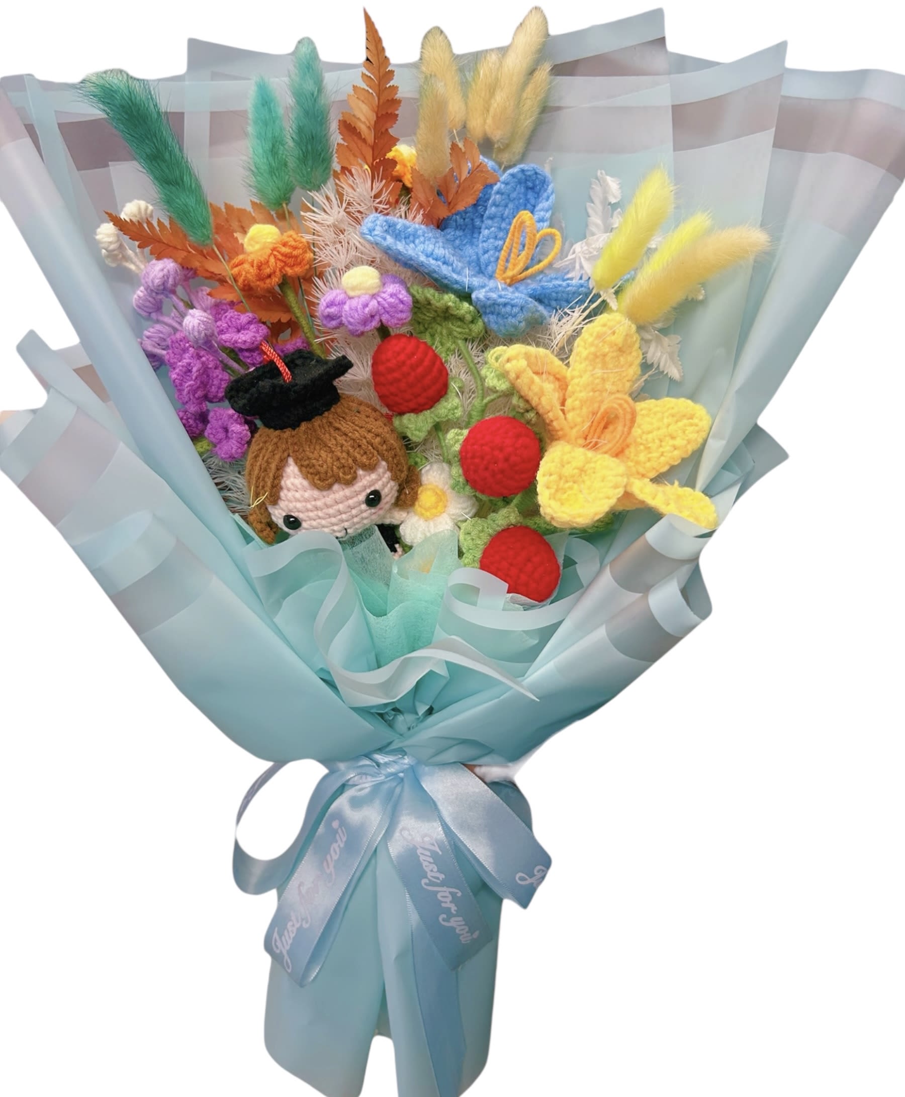 Graduation Edition Graduation Edition - Celebrate milestones with a touch of whimsy. This handcrafted crochet bouquet features vibrant yarn flowers, playful textures, and a charming graduate doll — a heartfelt, lasting alternative to fresh flowers. Perfect for graduation, congratulations, or simply bringing joy that never wilts.