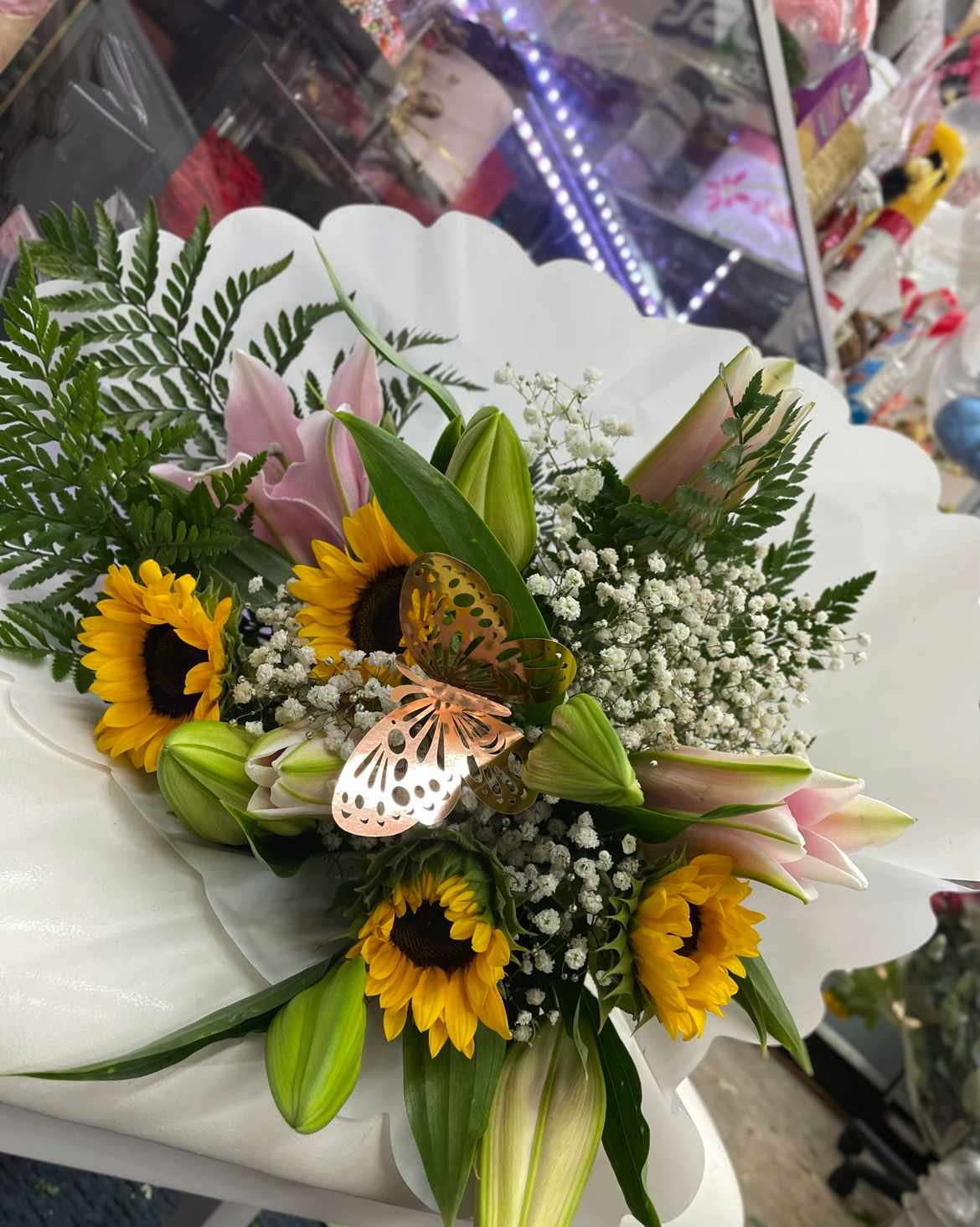 Sunflowers and pink lilies Sunflowers and pink lilies - Lilies with sunflowers . Babies breath and leather fern