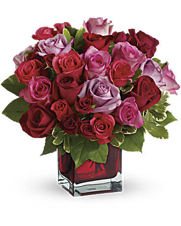  Love Bouquet  - A mix of red, pink, coral and lavender roses is contrasted by an understated collar of green salal leaves.