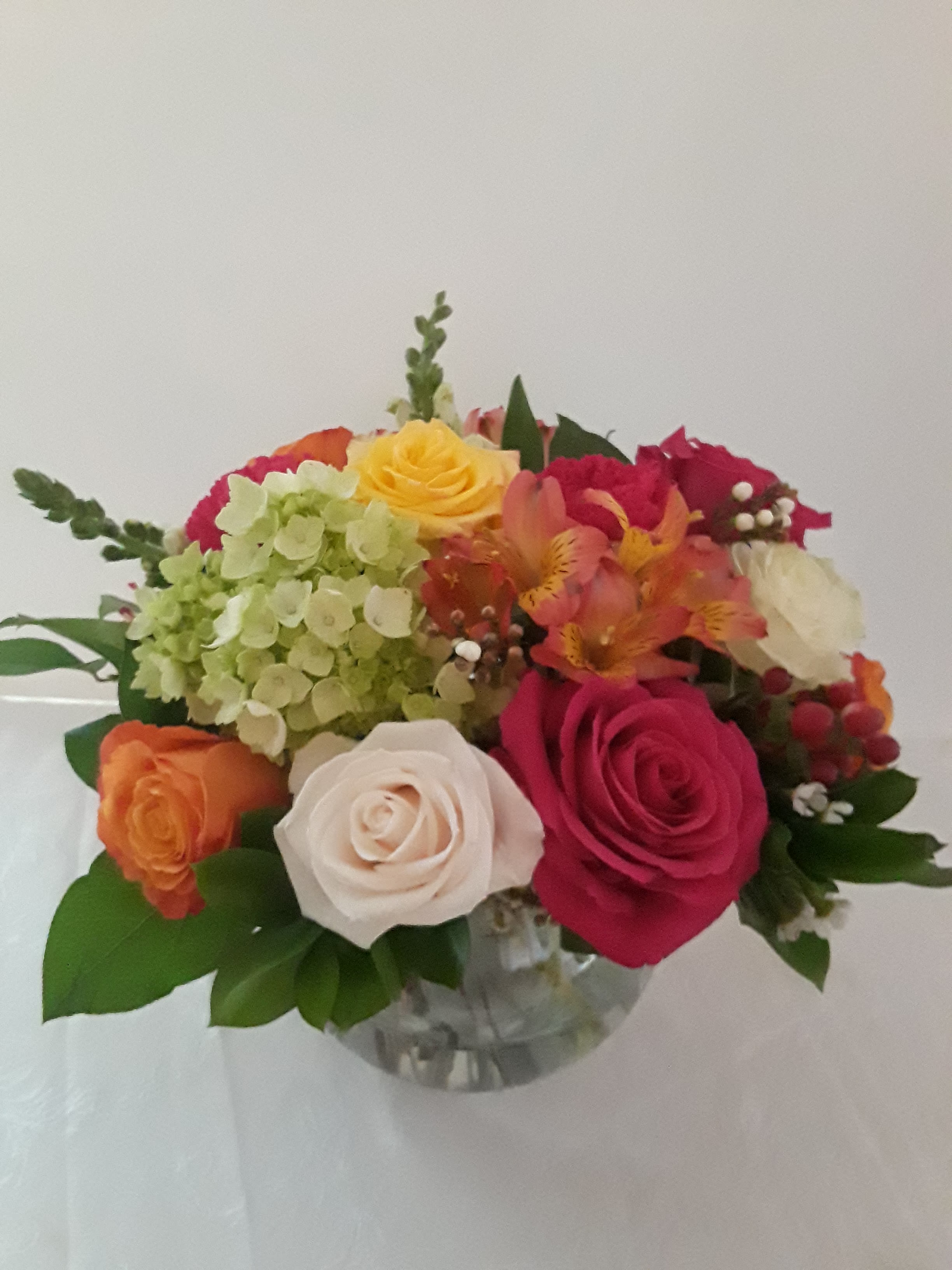 Colorful Day Colorful Day - A bouquet of beautiful mix flowers in a clear bow.