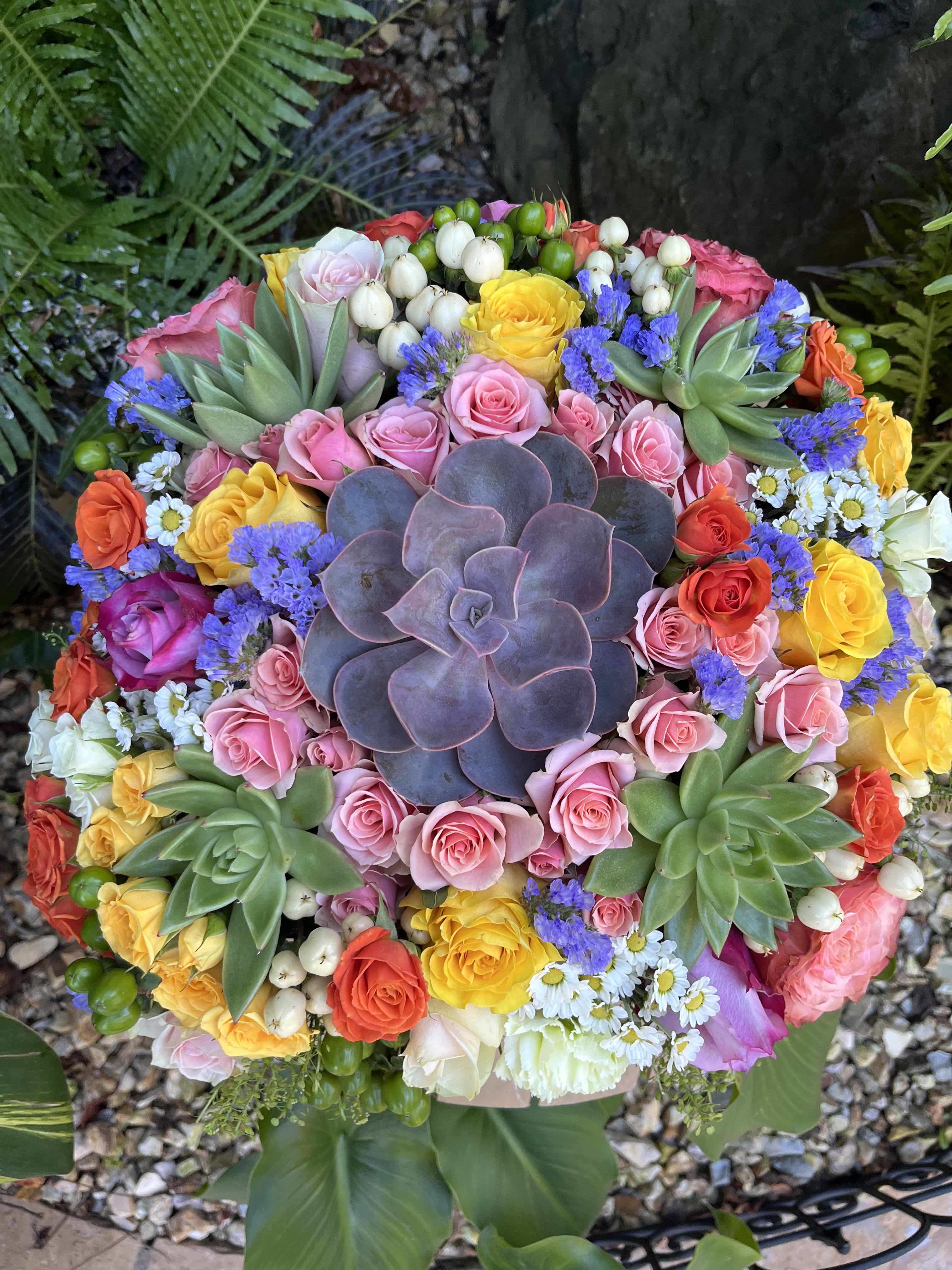 Happiest Birthday Happiest Birthday - This arrangement must be purchased by phone or using our Custom Arrangements section due to our use of flowers that are only available in certain seasons or can only be obtained with orders placed in advance.
