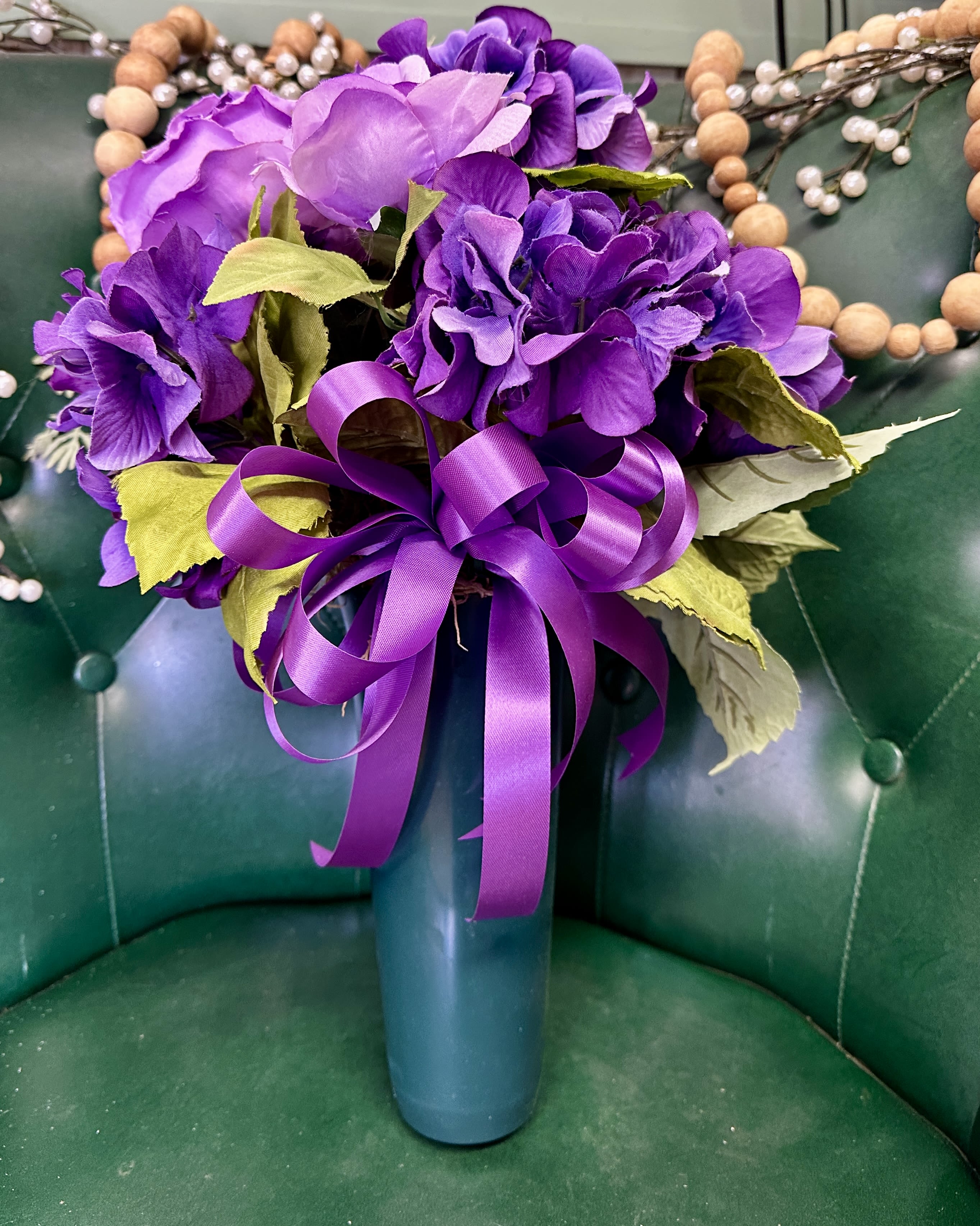Graveside Tribute Graveside Tribute - Silk floral arrangement arranged in a cemetery approved planter. This can be arranged in different colors, just let us know what you prefer. Please let us know the plot information in the special instructions area.