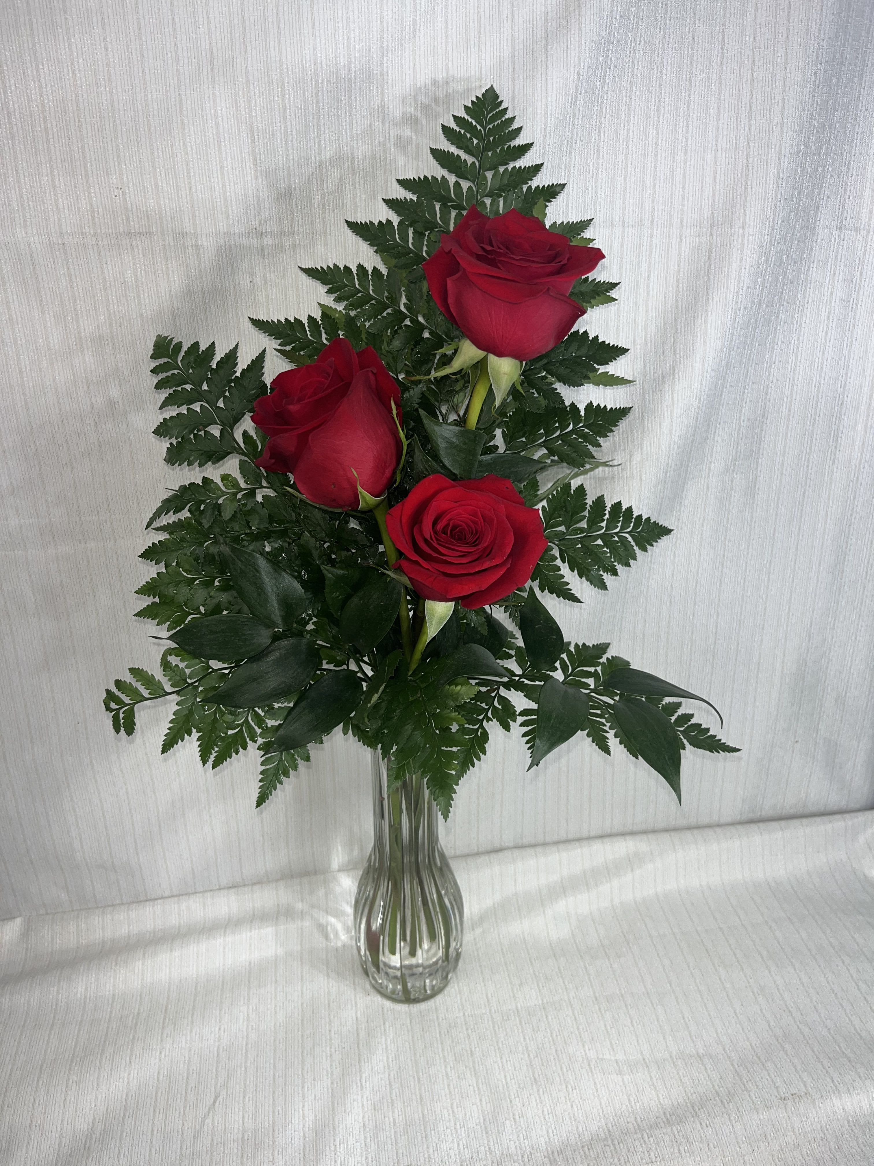 Three Roses in a bud vase Three Roses in a bud vase - Three Roses in a bud vase