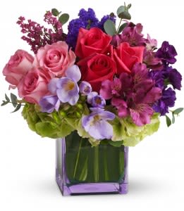 DANCING DELIGHT VASE ARRANGEMENT - They’ll be tickled to receive this arrangement, which is full of cheerful delight. Brighten up their day by sending this charming bouquet!