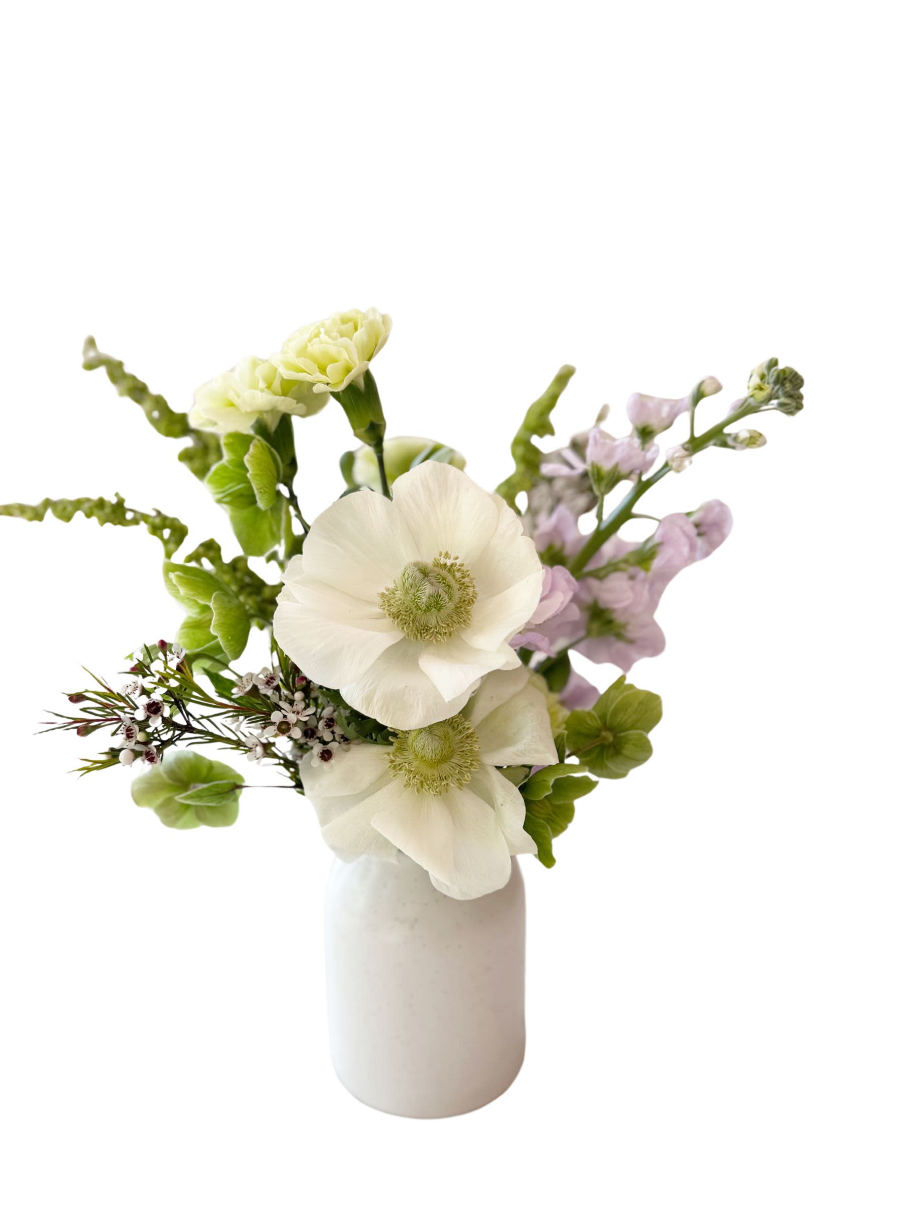 Petite Bud Vase  - This cute ceramic vessel features a petite collection of seasonal blooms and foliage. You will get approximately 6-8 blooms per vase including larger focal flowers, accent blooms and foliage stems.