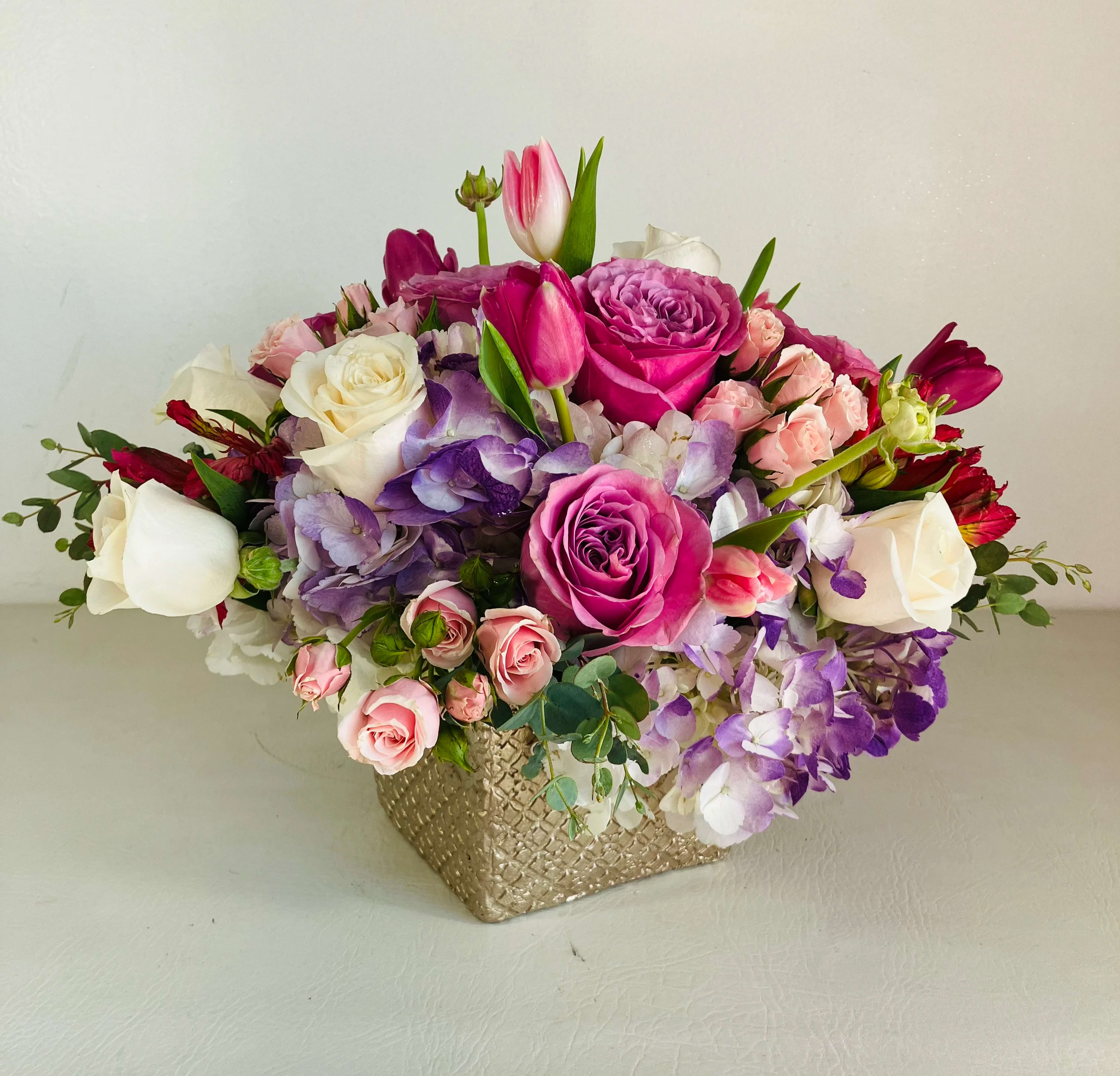 Ocean Breeze Ocean Breeze - Soft arrangement of Hydrangea, Roses and Ranuculus. One that will make her happy for the rest of the day.