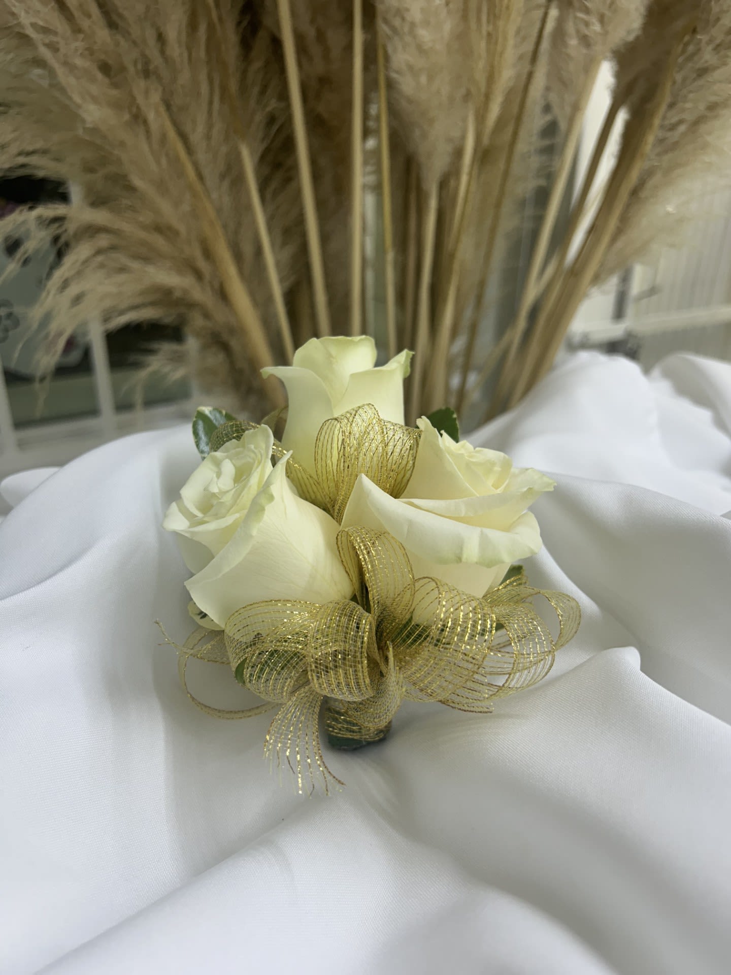 White Rose Corsage by BloomNation™  - Corsage with ribbon, this wrist arrangement looks good with any outfit. A perfect compliment to any prom, formal, or wedding event. Can be included with babies breath.  (Color may vary. If you have a specific color in ribbon/rose or will like with or without babies breath please leave on notes)