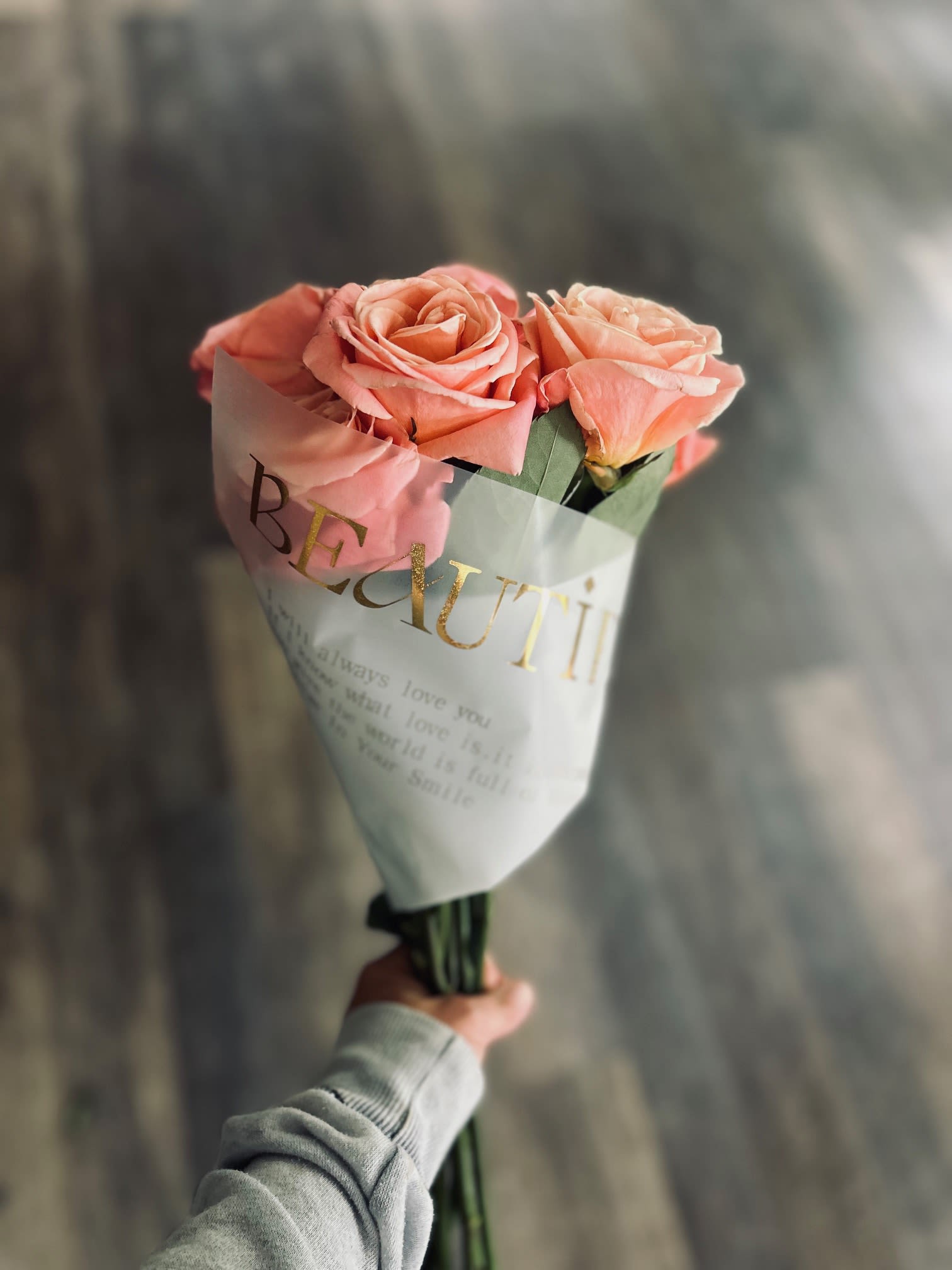 &quot;Beautiful&quot; - 1 or 2 dozen fresh cut roses of your choice, delicately prepared and wrapped in gold and pearl monogrammed floral paper, tied with ribbon of designers' choice.