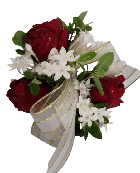 Custom Wrist Corsage with Roses - Something fresh and beautiful to wear for that special occasion or dance. This corsage will be designed just for you! You pick the main focal color and depending on your selection of Standard, Deluxe or Premium, Sue will design and create your custom wrist corsage using carefully selected blooms like Roses complimented with other smaller blooms and greenery to create a one of a kind wrist corsage. If you prefer all one color please state this in the Special Instructions at check out. If you prefer a specific color ribbon, mention this in the Special Instructions section as well. If necessary, Sue will personally call the contact number to coordinate any other details within the price chosen.