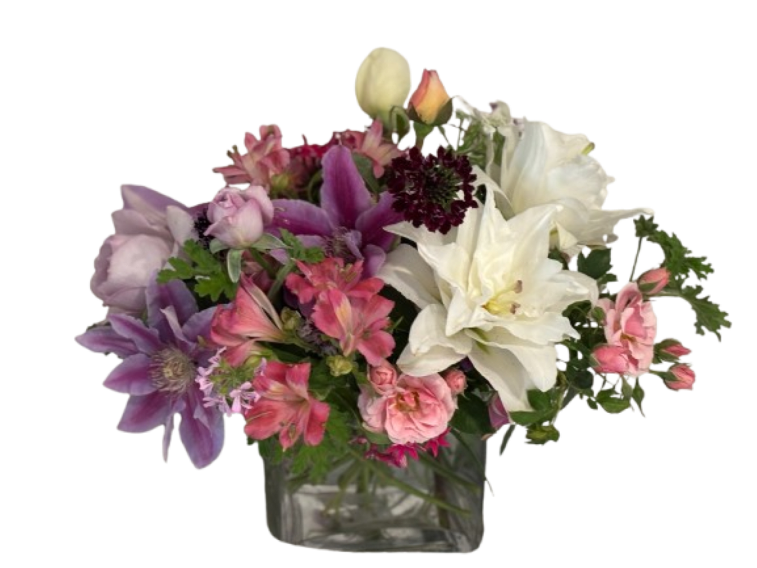 Centerpiece Arrangement - this centerpiece arrangement has lilies, Alstroemeria, Roses, and more flowers in it and will make a beautiful centerpiece for your table.