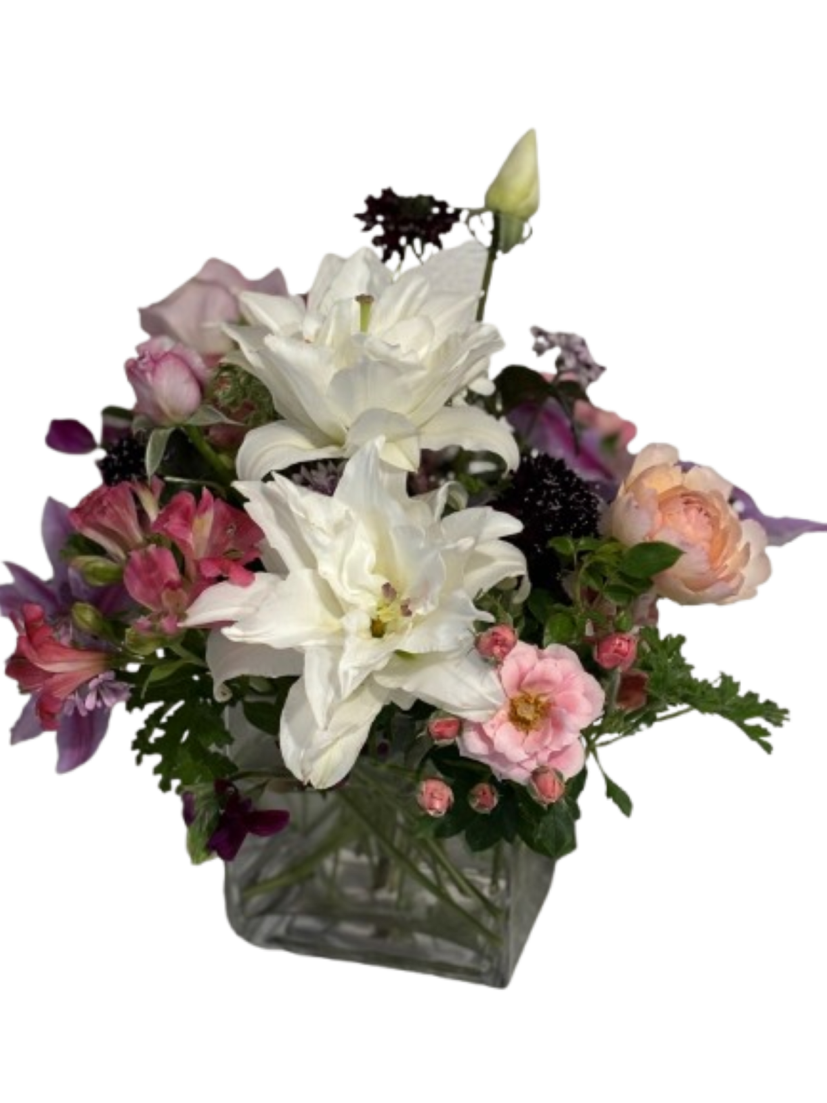 Lily Rose Arrangement - An arrangement of Lilies, Roses, Alstroemeria, and more flowers. This can be made into a centerpiece for your table.