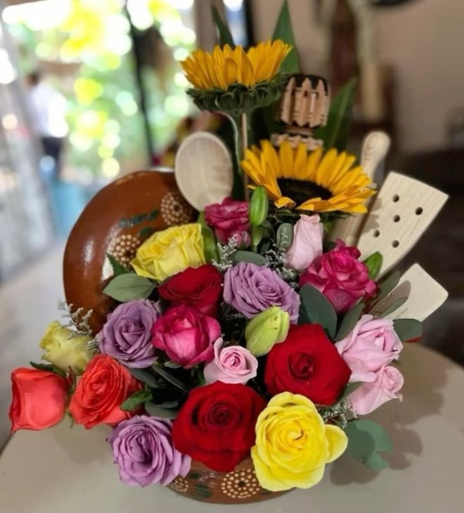 TORTILLERO ARRANGEMENT  - A beautiful arrangement with mixed roses, the base is a very pretty clay tortilla holder to keep as decoration!!!