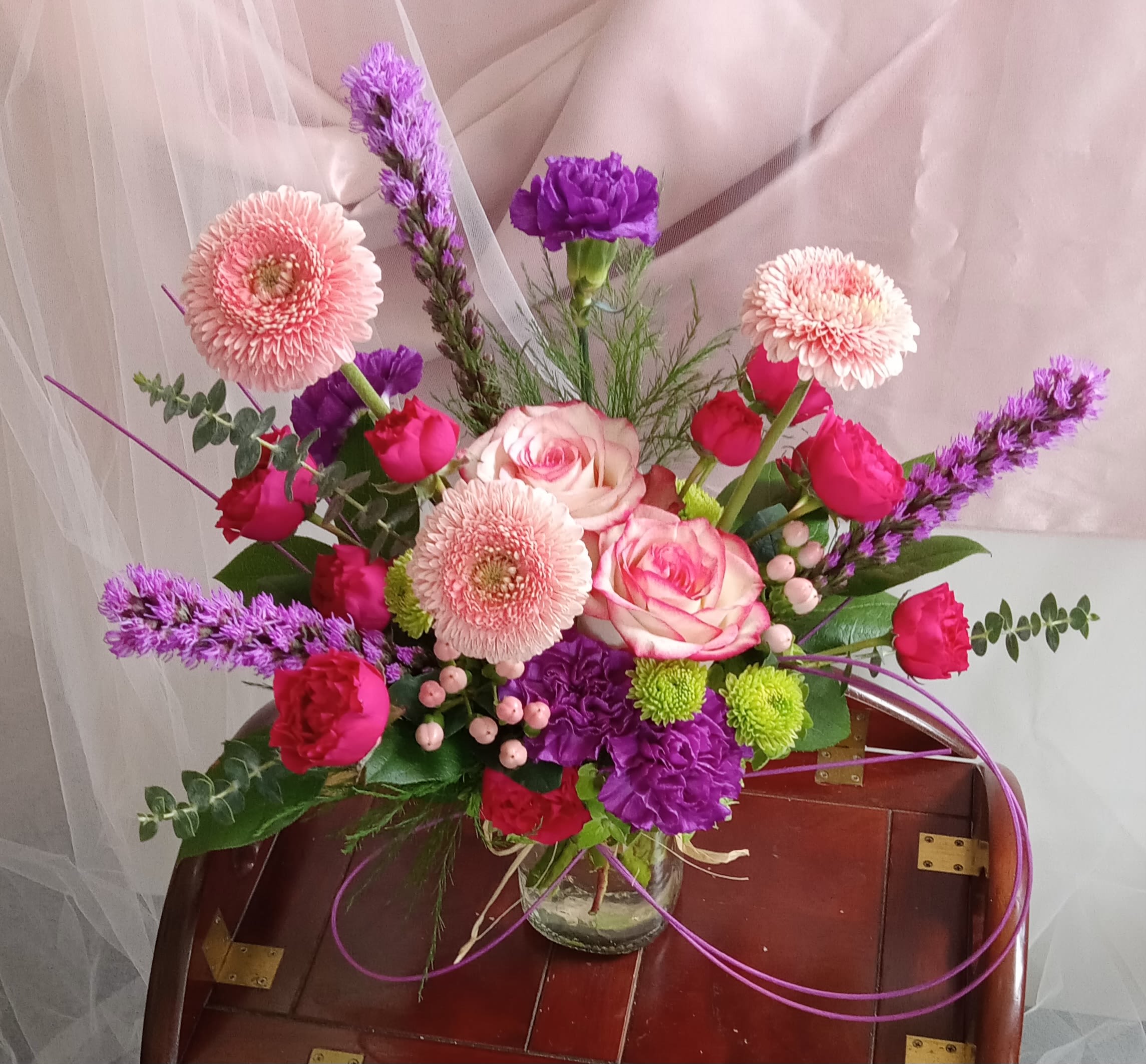 Deluxe Designer's Choice - Allow us to use our imagination and create you something truly spectacular  for your loved ones special occasion.  Every Designer's Choice, no matter the size or price, has EXTRA thought, love and consideration added to convey your emotions through flowers.  Each creation is a unique piece of floral artistry crafted just for you based on the listed occasion and written card message. Give this one a try,  you and your recipient will be pleasantly surprised!  If by chance, you have a special request, please enter it in the &quot;NOTES&quot; section of your order form and we'll do our best to fulfill your wishes!  Thanks, S &amp; K Photos are past Designer's Choice arrangements and for size comparison ONLY!  PHOTO A - $79.99 PHOTO B - $89.99 PHOTO C - $99.99