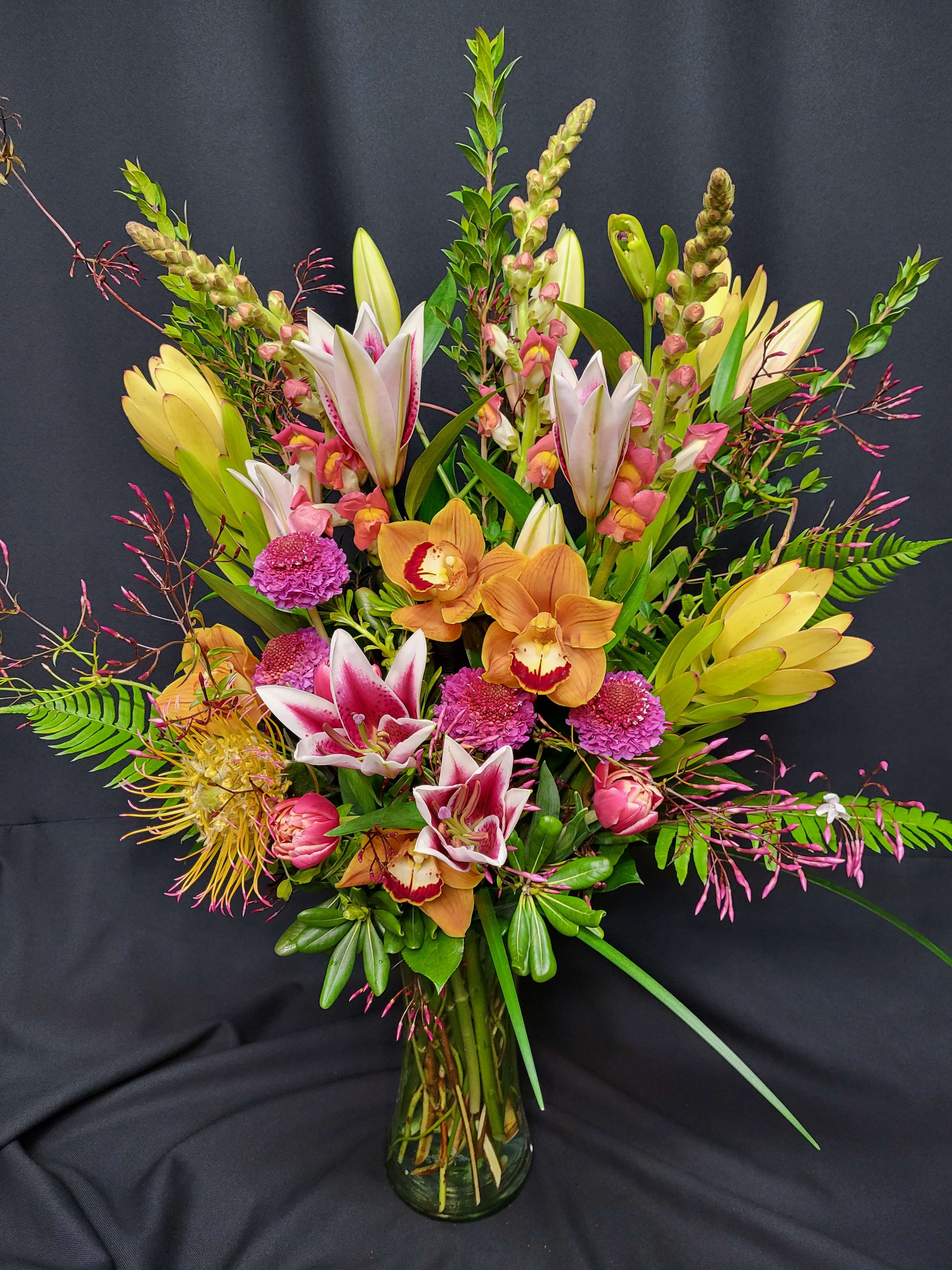 Fragrant flower Bouquet - There are NOT many fragrant flowers and THIS beauty has it all. Jasmine flower and Stargazer type Oriental lillies.Order 2 weeks prior / 3 weeks ahead of Valentine or Mother's day.    Jasmine is NOT always in season so if that is the case we will sub with more of the lillies or something else with a fragrance.