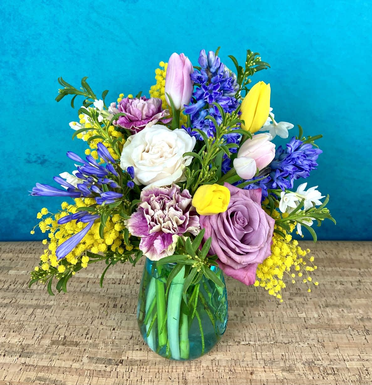 Celebration Of Life - Sympathy flowers can be colorful - to celebrate the life of a loved one.  These are appropriate to send to services or their home. Arrangements include a butterfly, bird, or bee to commemorate the loved one.