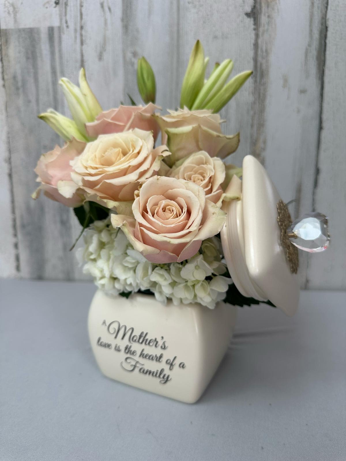 SUPER MOM!! - NICE ARRANGEMENT IN A CERAMIC JEWERLY BOX WITH  PINK ROSES, WHITE LILIES AND HYDRANGEA IN A PERFECT ARMONY.  AND AFTER THE FLOWERS SHE CAN KEEP THE CONTAINER