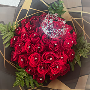 Bouquet of 36 Red Roses with Silver crown - Stunning Bouquet of 36 long stem red roses with leather leaves, fashionable rhinestone decor on every rose and a silver crown with a water proof paper all around.
