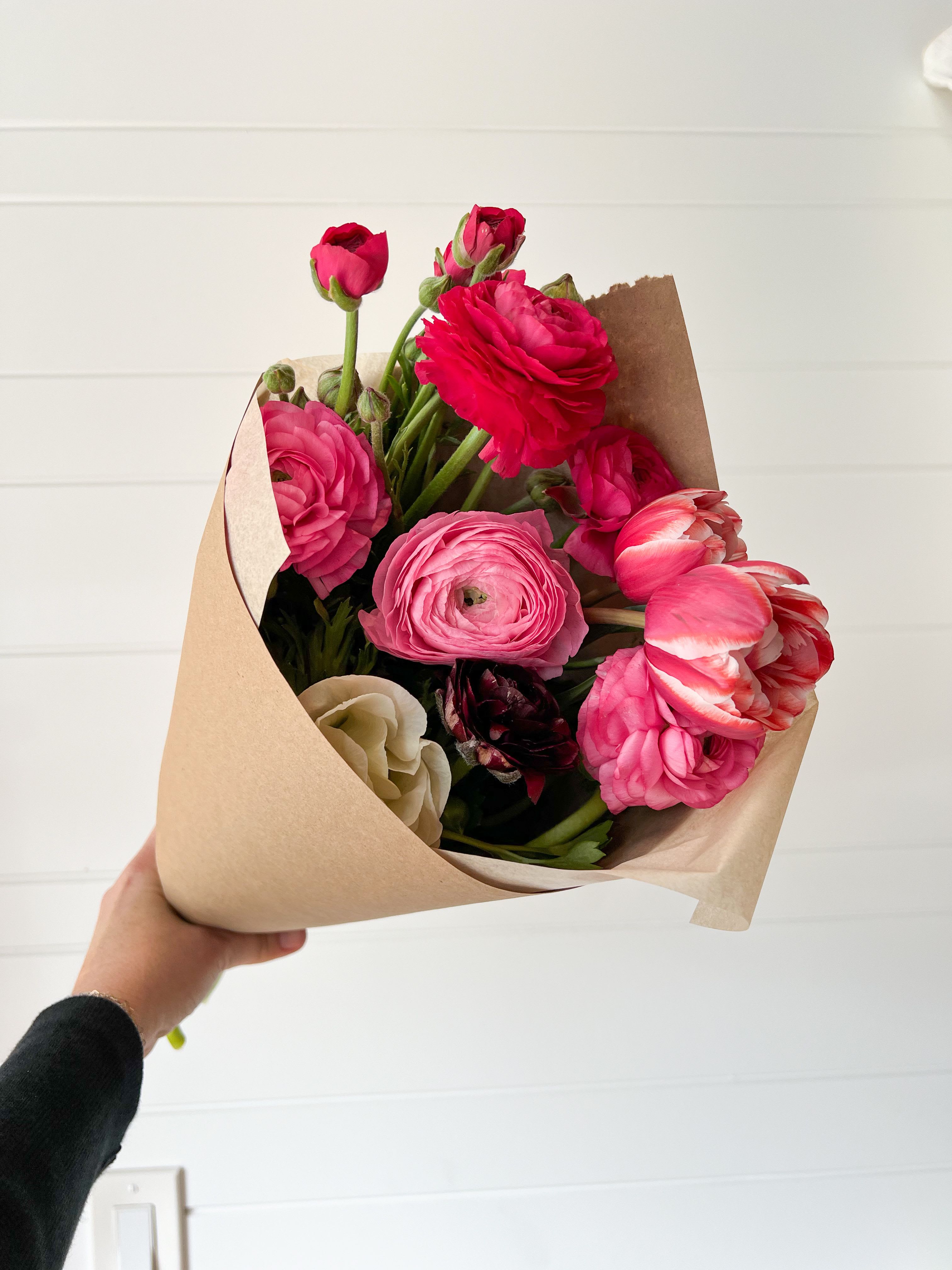 Romance in Bloom Flower Bouquet Romance in Bloom Flower Bouquet - A celebration of color, texture, and heartfelt beauty, our "Romance in Bloom" bouquet features a hand-tied selection of fresh, seasonal flowers in rich shades of crimson, blush pink, soft white, and deep burgundy. Wrapped in simple, elegant paper and tied with ribbon, this bouquet is ready to give — perfect for making someone feel truly special. Whether it’s for an anniversary, a romantic gesture, or just because, these blooms evoke warmth, passion, and timeless charm. Each bouquet is thoughtfully arranged to showcase the natural beauty of the season’s best flowers — no two are exactly alike, but all are unforgettable. Available for local pickup or delivery. Freshly made to order with love and care. Flower delivery is available in Newport Beach, Balboa Island, Costa Mesa, Santa Ana, Irvine, Huntington Beach and Laguna Beach.