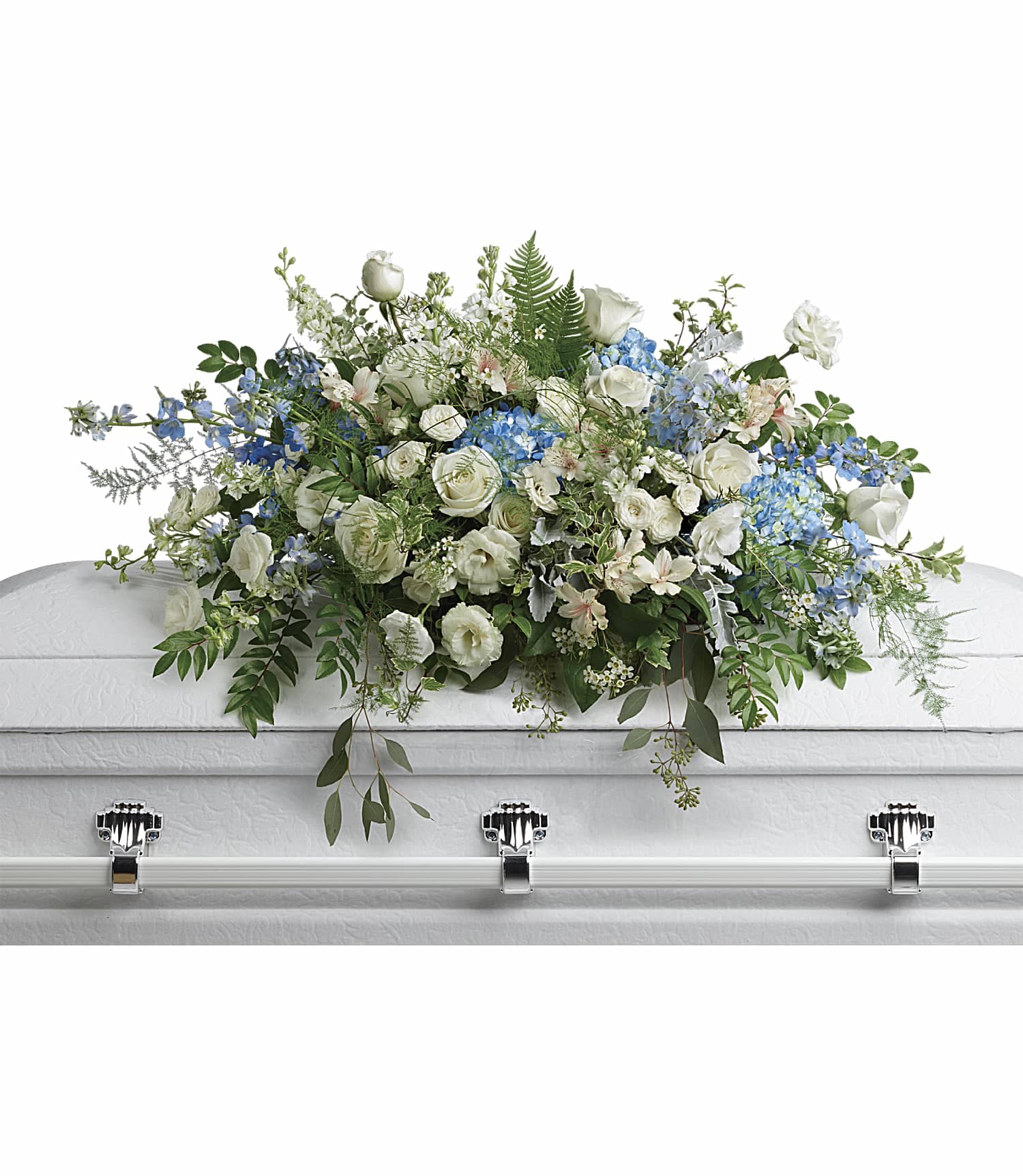 Tender Remembrance Casket Spray - As soft and delicate as a tender remembrance, this stunning spray of sky blue hydrangea and pure white roses brings a fresh, natural beauty to the casket.  This stunning spray includes blue hydrangea, white roses, white spray roses, white alstroemeria, white lisianthus, blue delphinium, white larkspur, white stock, white waxflower, dusty miller, huckleberry, asparagus plumosus, pitta negra, lily grass, dagger fern, and lemon leaf.