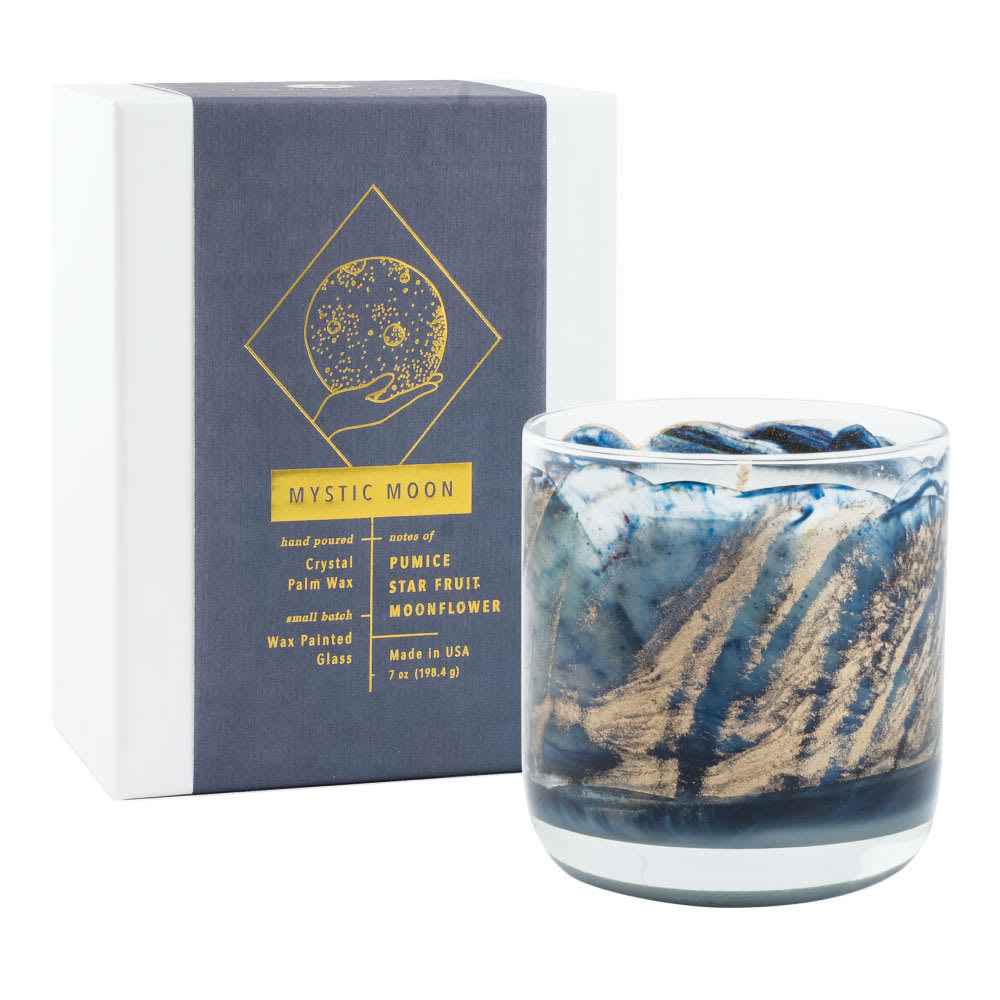 Mystic Moon Candle (Kim's Favorite!) Mystic Moon Candle (Kim's Favorite!) - Fragrance Notes: Pumice, star fruit & moonflower Product Details: Burns 35 hrs Measures 3.5in x 6.75in The Meditation Collection is hand made using our exclusive wax painted technique, now featuring new glassware and packaged in a gift-ready box. These unique candles are hand poured with palm wax that forms crystal-like patterns that creates a reflective glow as it burns.