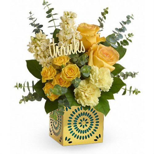 Thanks Bouquet Thanks Bouquet - Show your appreciation in a most stylish way with this sunny bouquet of yellow roses, stock and carnations! The happy bouquet is hand-delivered in a shimmering golden cube with delicate cutouts. Remove the teal liner and "thanks" and the cube becomes a contemporary candleholder.