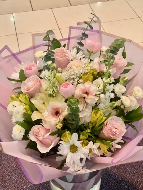 Mothers day Princess Pink - An artistic and soft arrangement is a pleaser and interesting as it is impressive.  soft pink and White with a touch of yellow is an architectural design give this arrangement its unique appeal.  Wrap or Vase same price