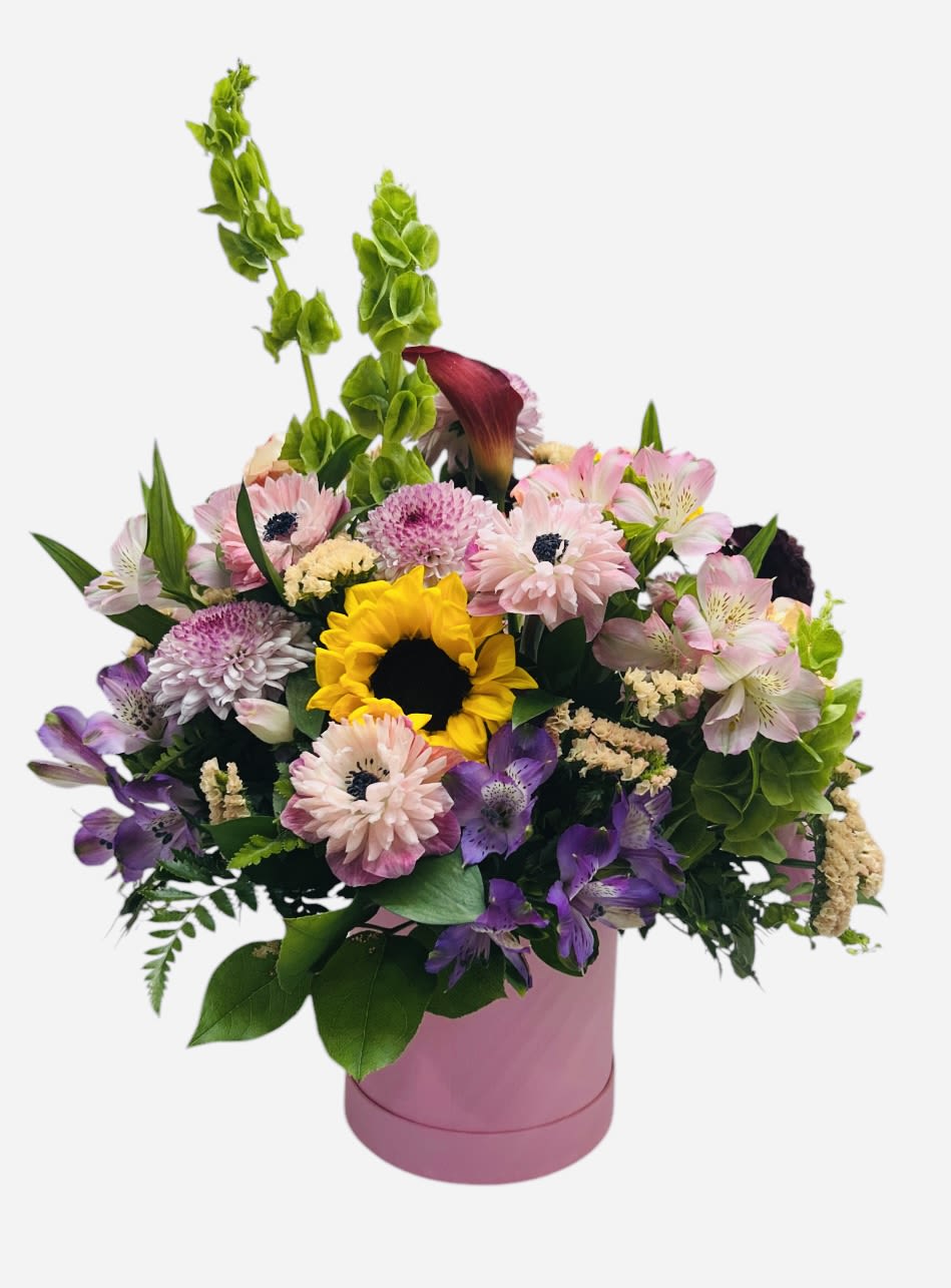 Floral Hat Box - We use our freshest blooms to fill this hatbox with color and whimsy.