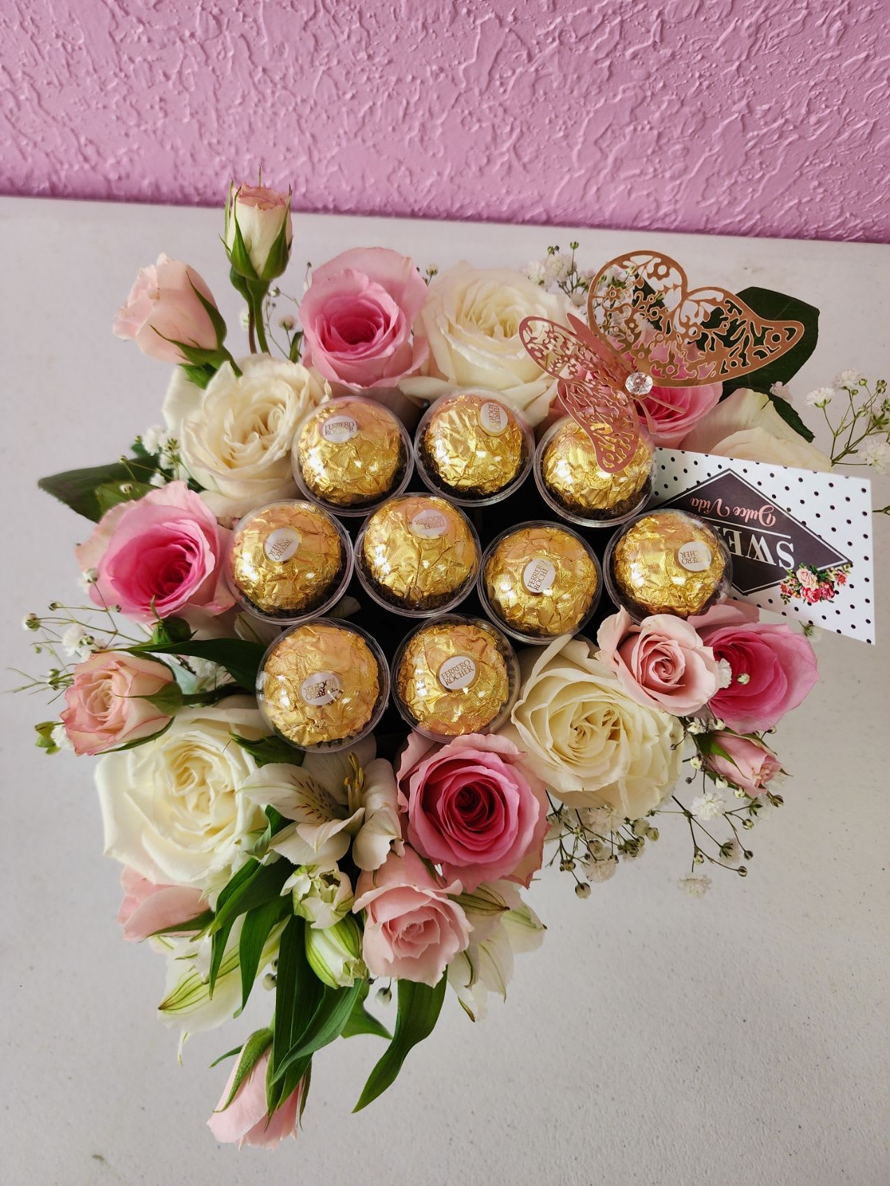 Linda Box - Beautiful arrangemet in a heart box.pic the  Colors . Red, Pink, White Black... Choose the Color of your Roses,, 12 Roses , 10 Ferreros Rosher chocolate