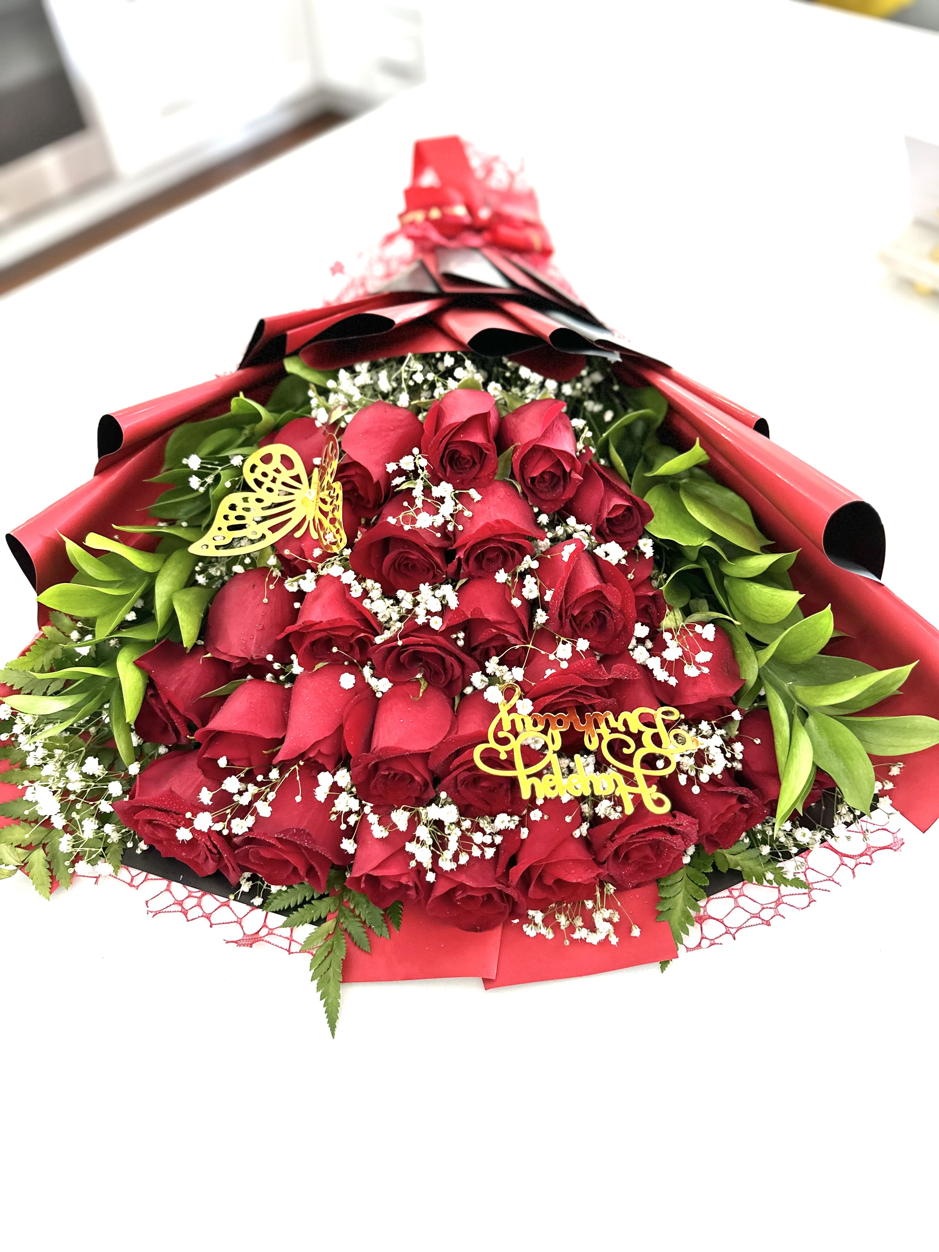 Layered red roses  - Layered red roses with greenery 