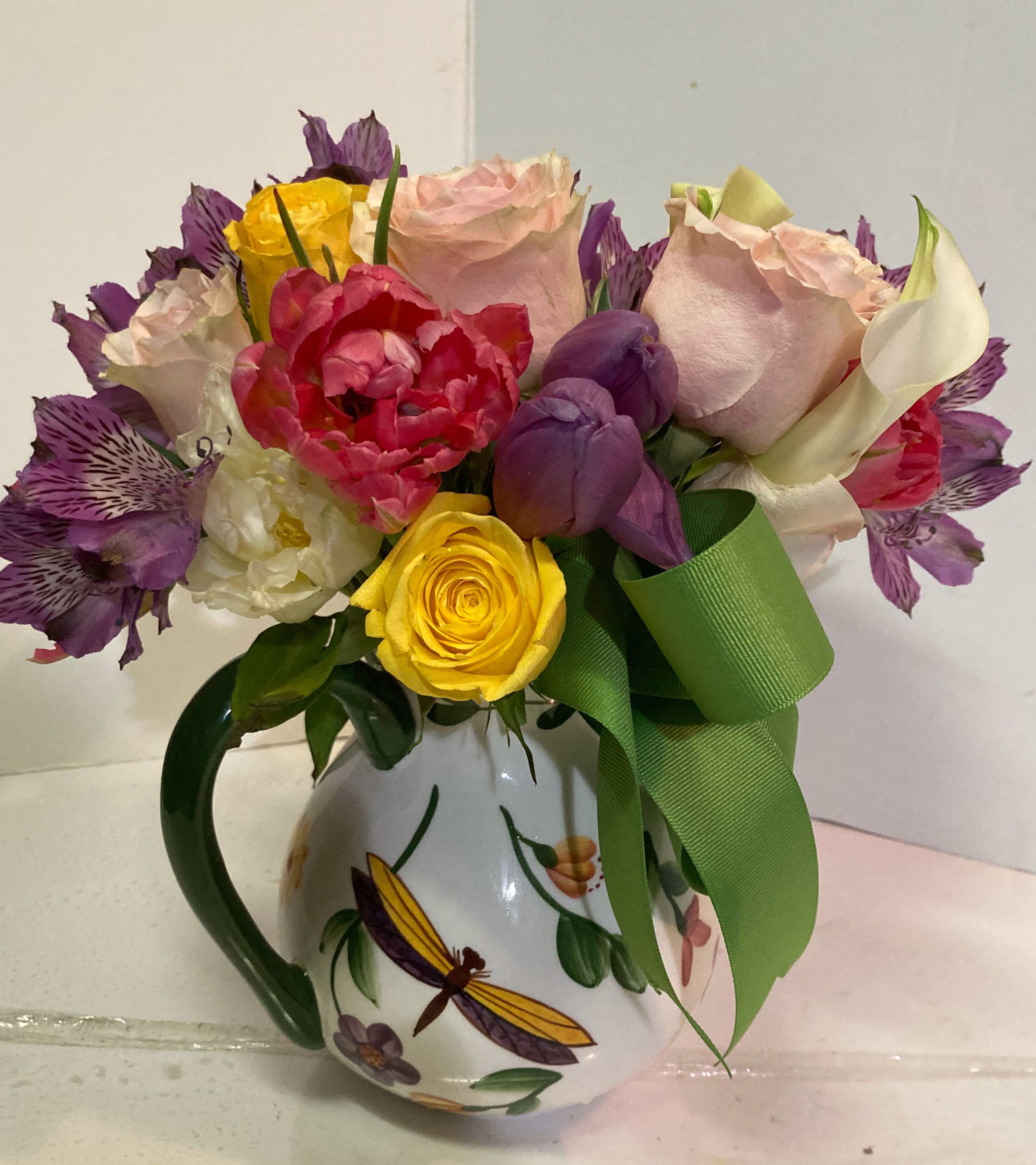 PITCHER PERFECT FOR MOM - A MOTHER'S DAY COLLECTION A cheerful and colorful bouquet with playful structure