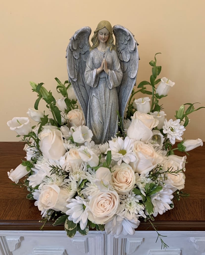 Praying Angel Garden - A mixed fresh arrangement consisting of White/Cream Roses, White Campanula, White Daisies, White Mums, and White Wax Flower.  This arrangement can also be made in a colorful option with mixed flowers that we have available in stock.  If you would like this option, please specify when placing your order.