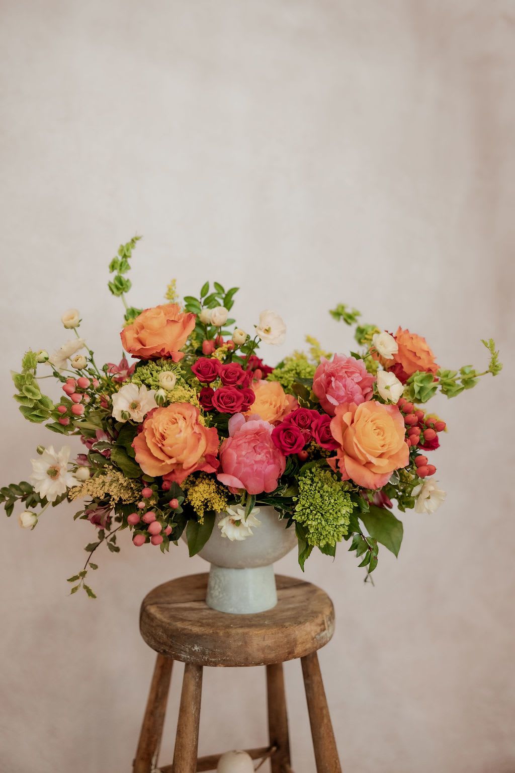 Grand Meadow - A designers choice arrangement full of lush, premium seasonal blooms. Due to the artistic and seasonal nature of this design, it will vary from the photo - but the signature style and full garden-inspired beauty will remain the same.   Custom color palette requests welcome: choose from bright and cheerful, moody and romantic, or soft pastels. 