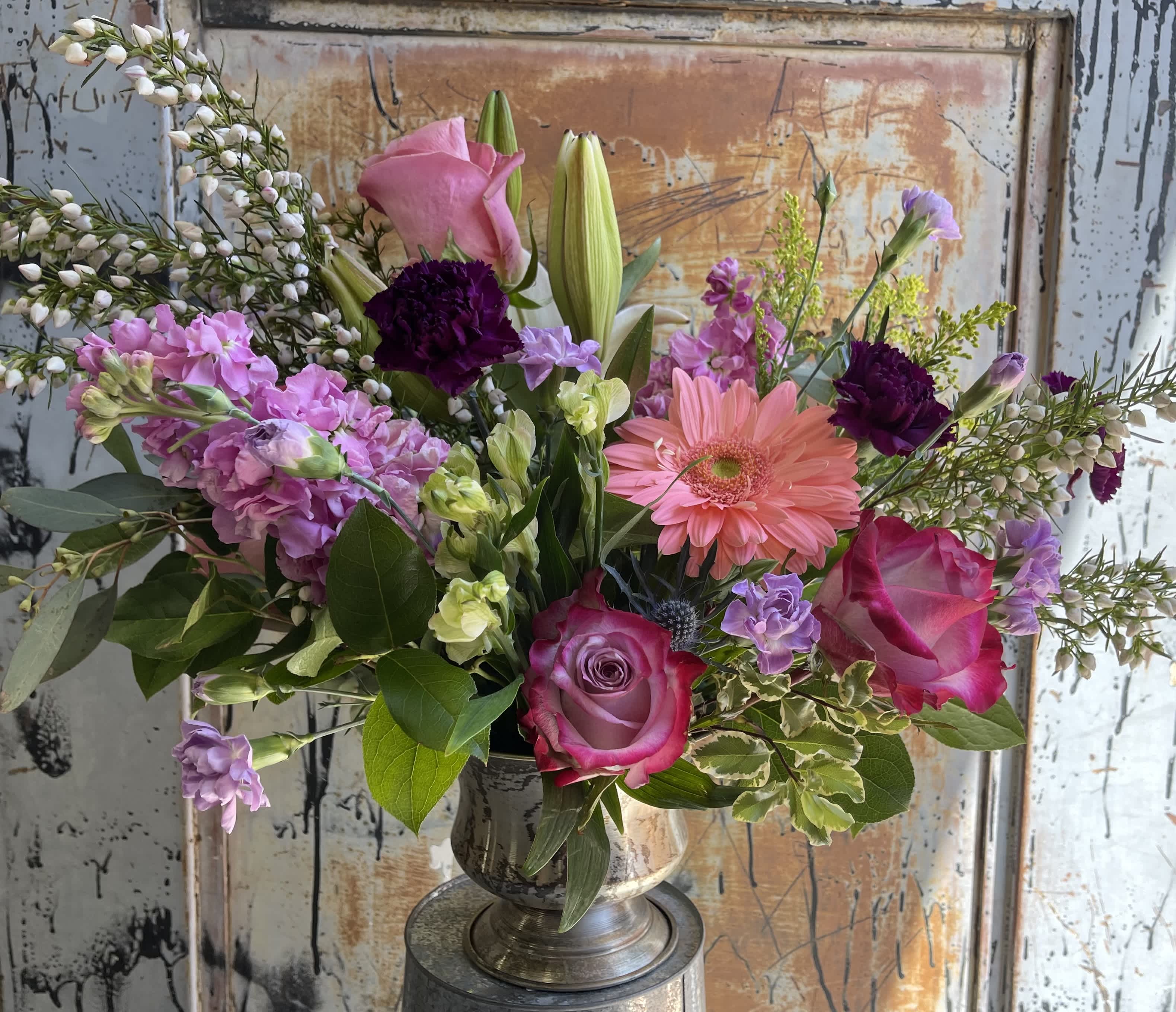 Daisy  - This arrangement is uniquely crafted and inspired by our love for daisies. Florals may vary depending on product availability.