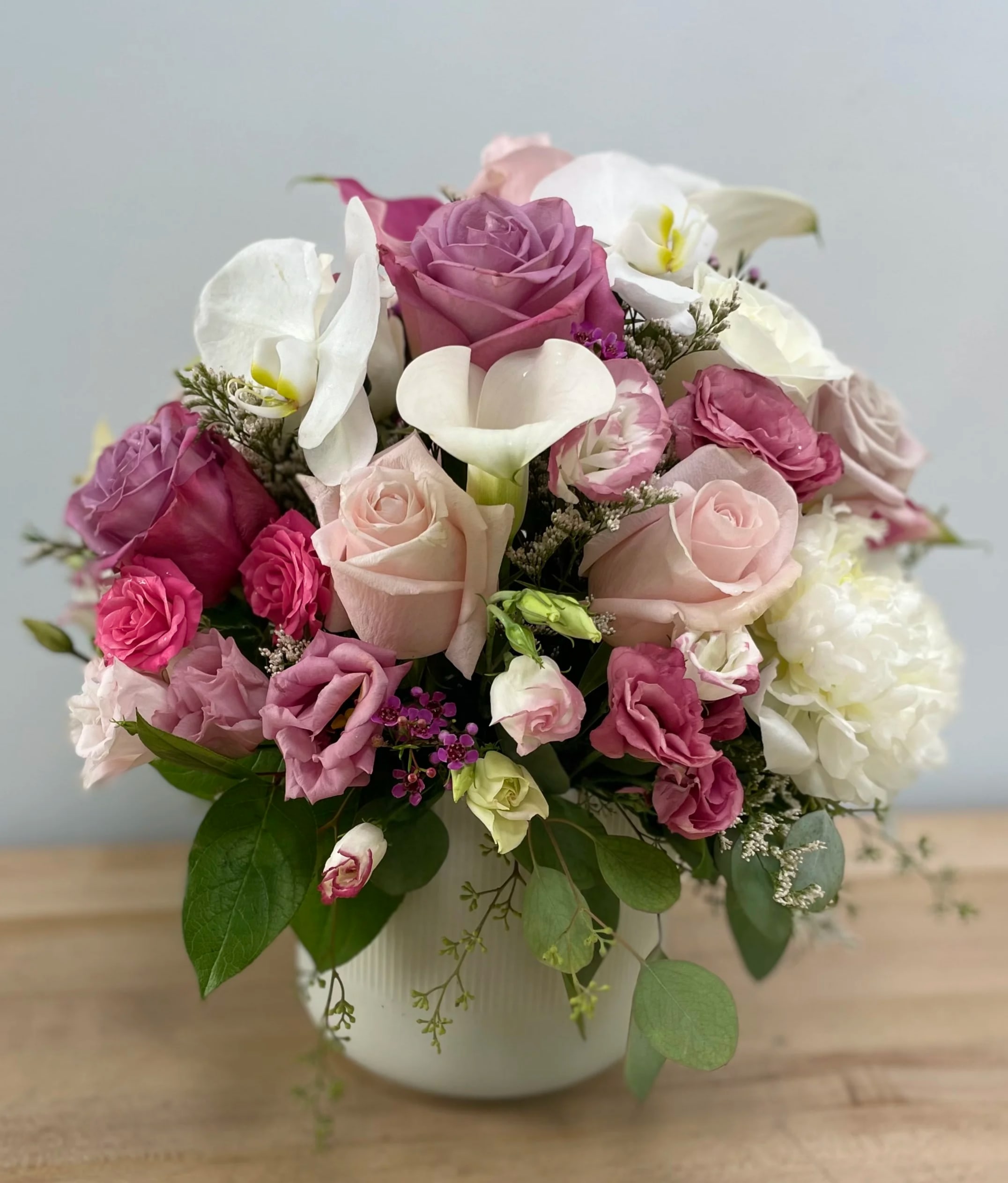 Pink Moments Pink Moments - An arrangement with a blend on pink shade complimented by touches of white. Perfect for any occasion to remember.