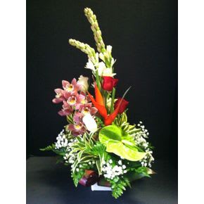 Everyday Tropical Arrangement Everyday Tropical Arrangement - Enjoy a perfect fusion of our island's freshest tropicals! From heliconia, anthurium, orchid, and local foliage, this is a treat that features a great selection of floral paradise! Product ID: 002